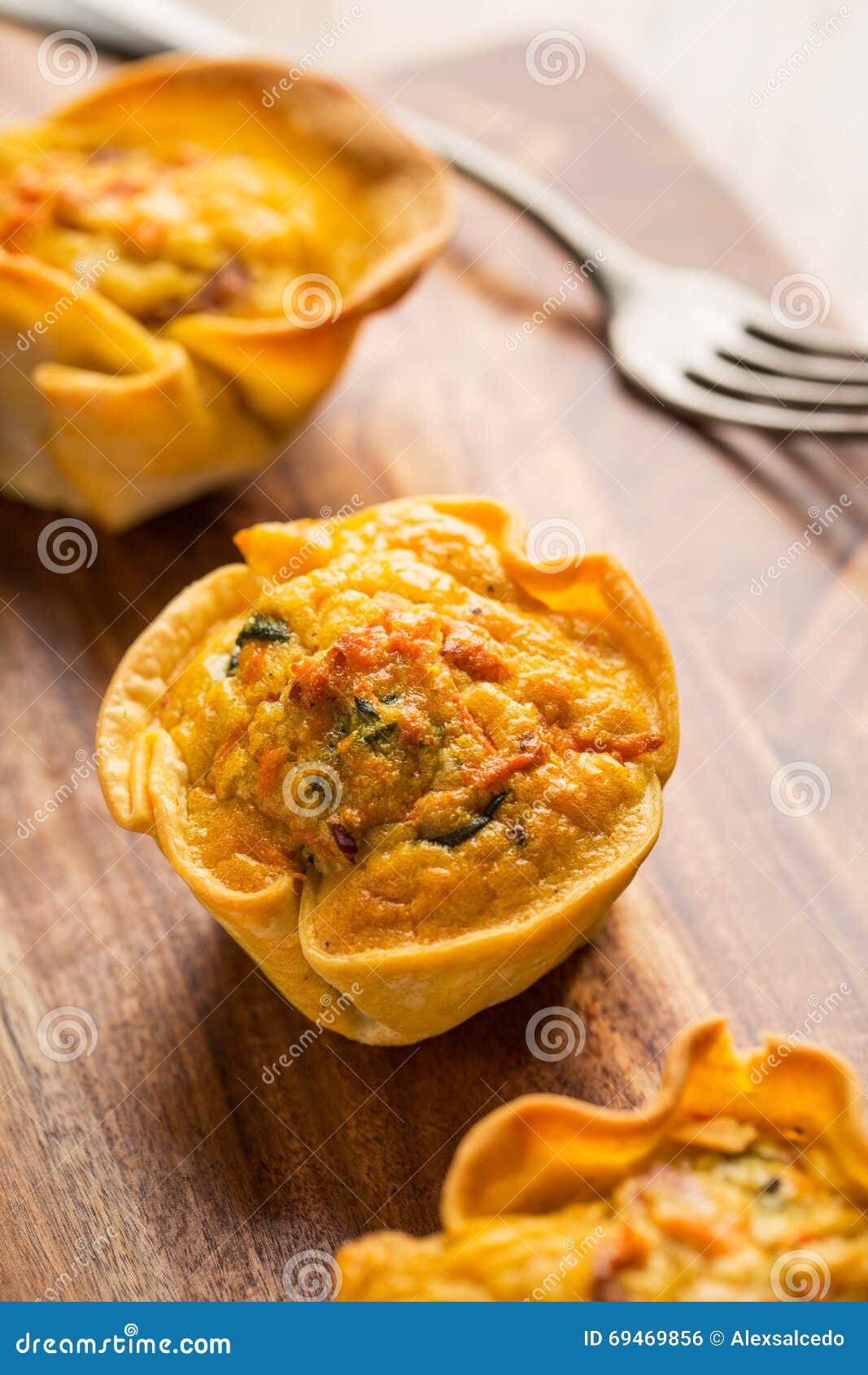 Small vegan carrot quiche stock photo. Image of meal - 69469856