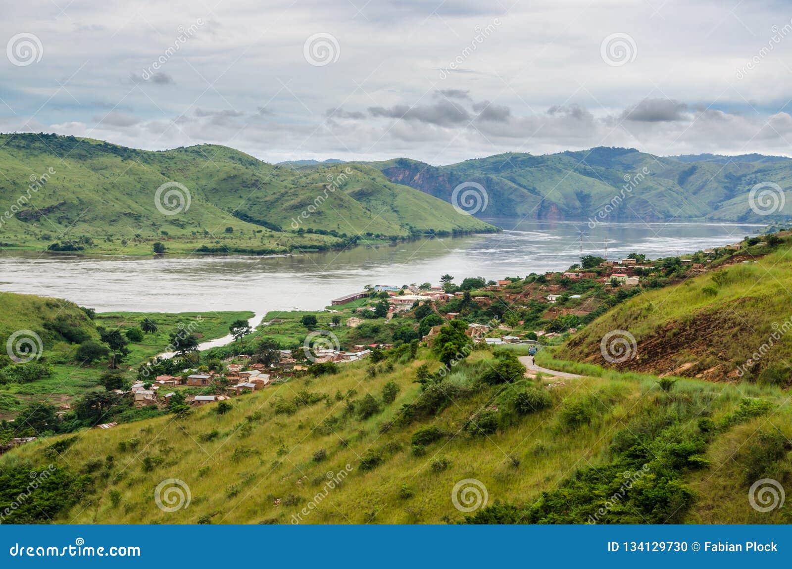 small village in green hills at congo river, democratic republic of congo, africa