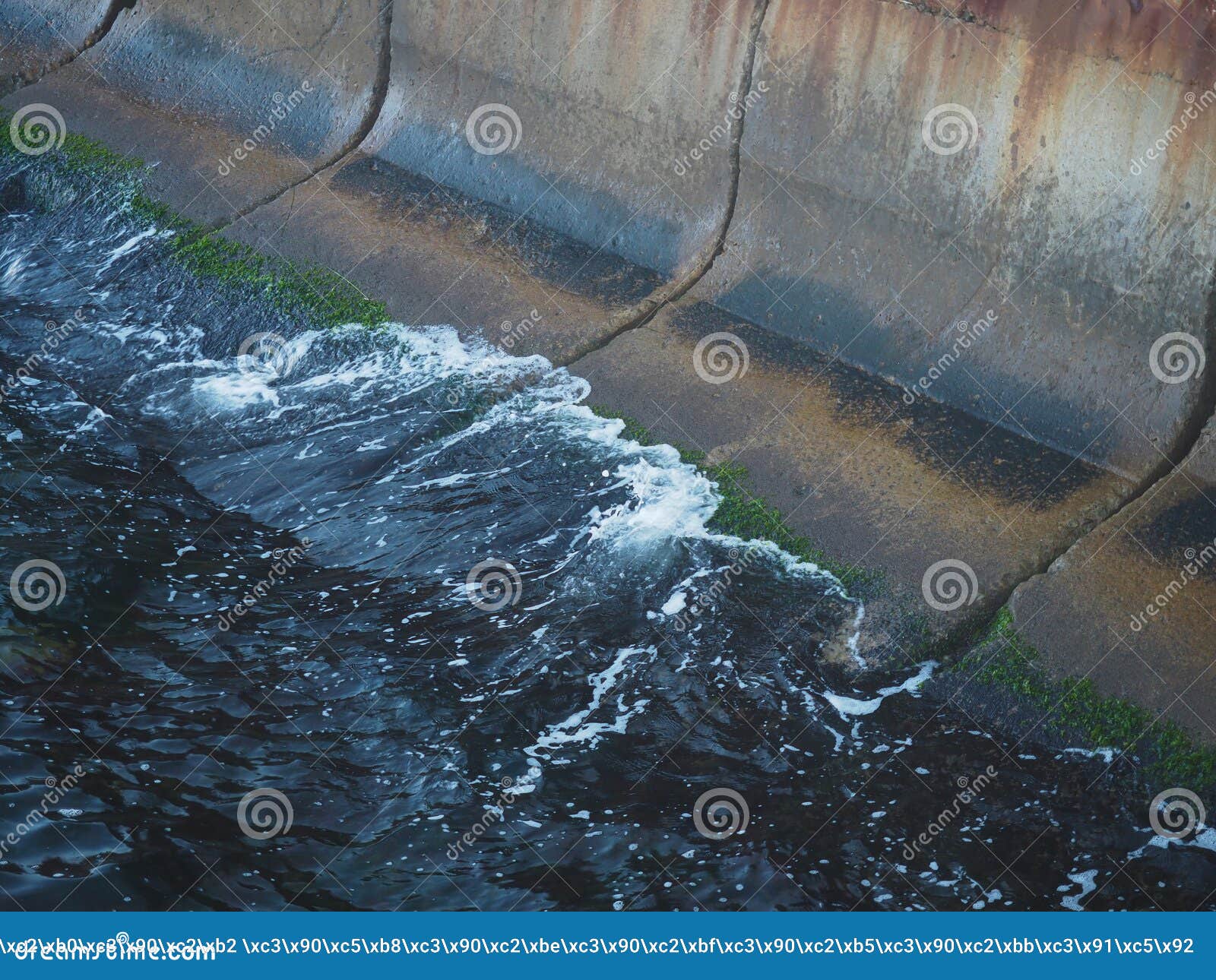 A Small Wave Hits the Concrete Slabs of the Dock Stock Photo Image of