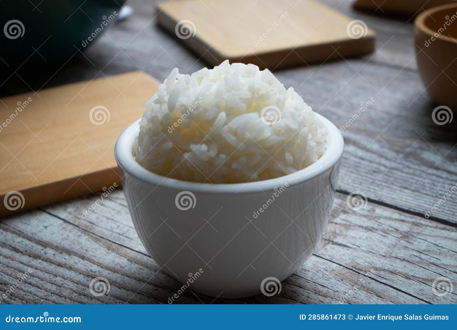 small white bowl with white rice.