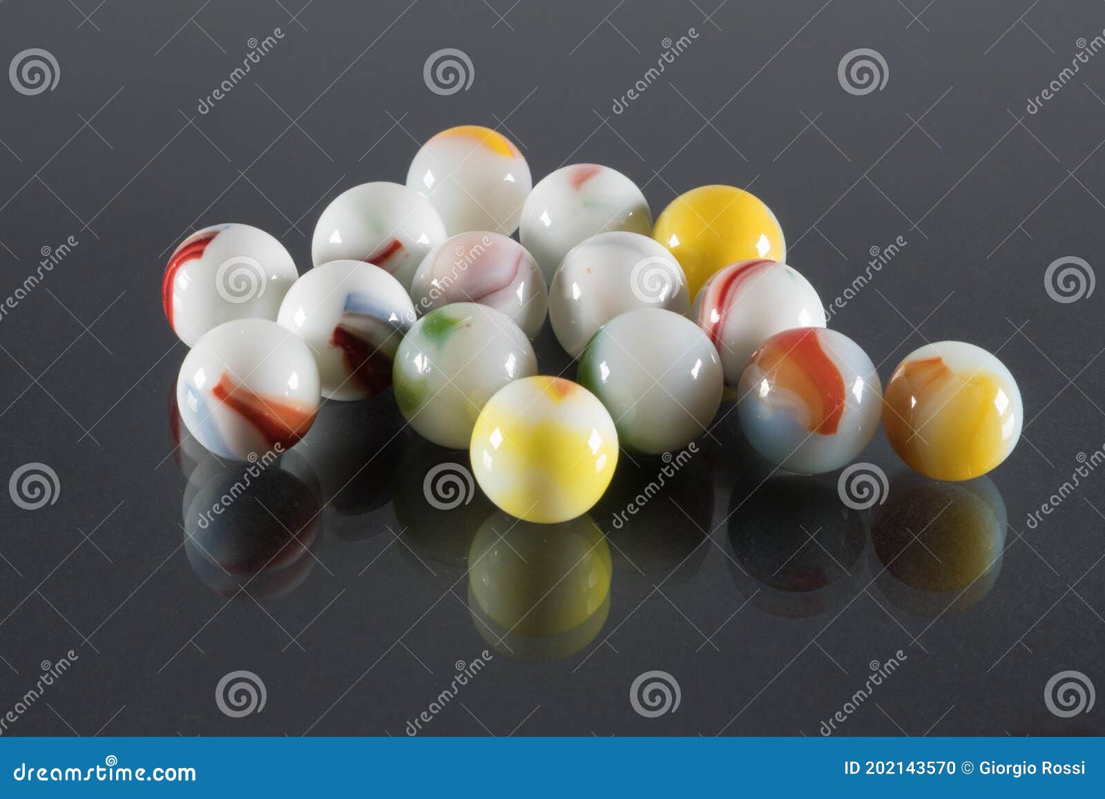 Small White Ceramic Balls with Veins and Black Background Stock Photo