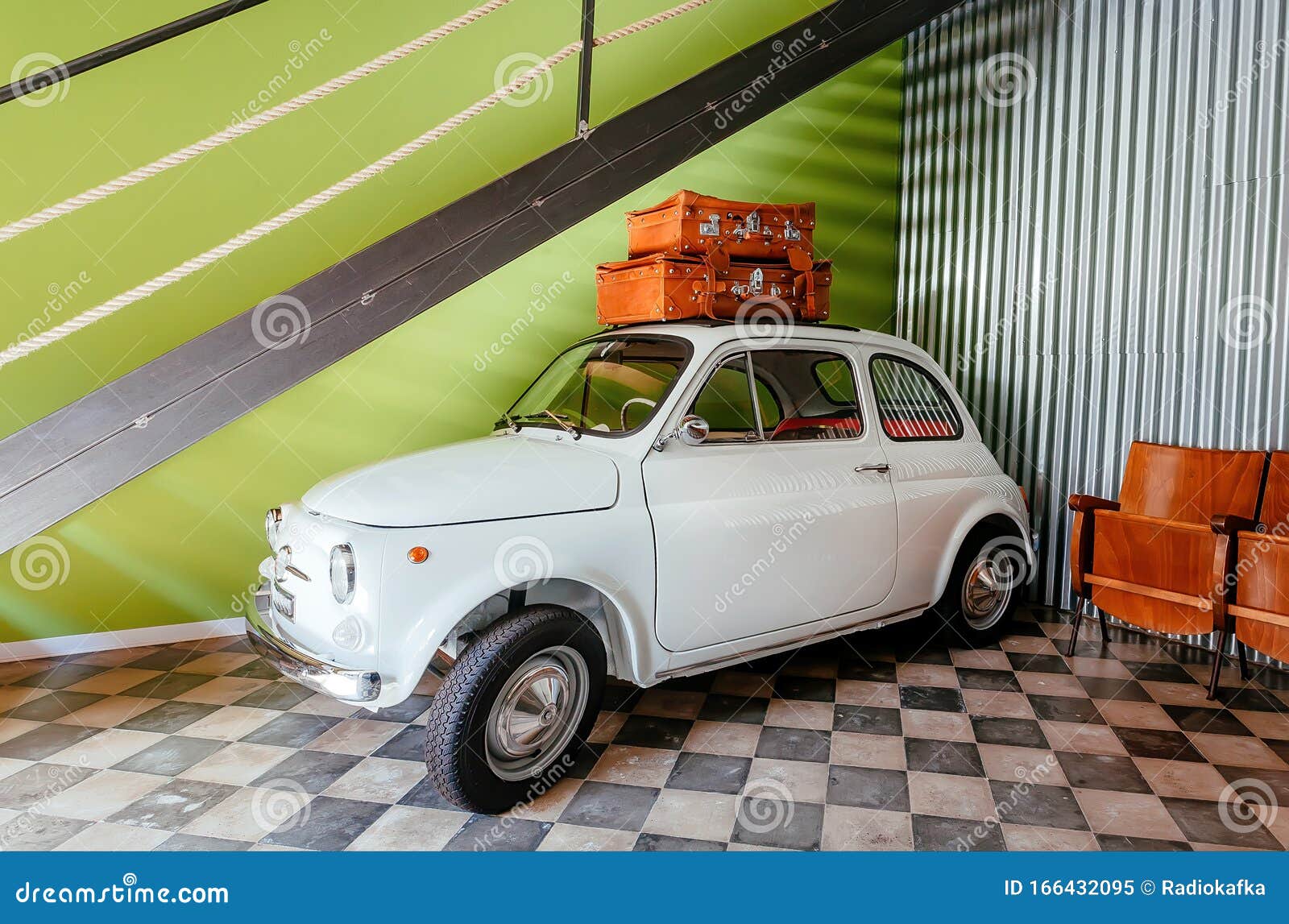 Small White Retro Car Inside House, Ready for Travel Stock Image