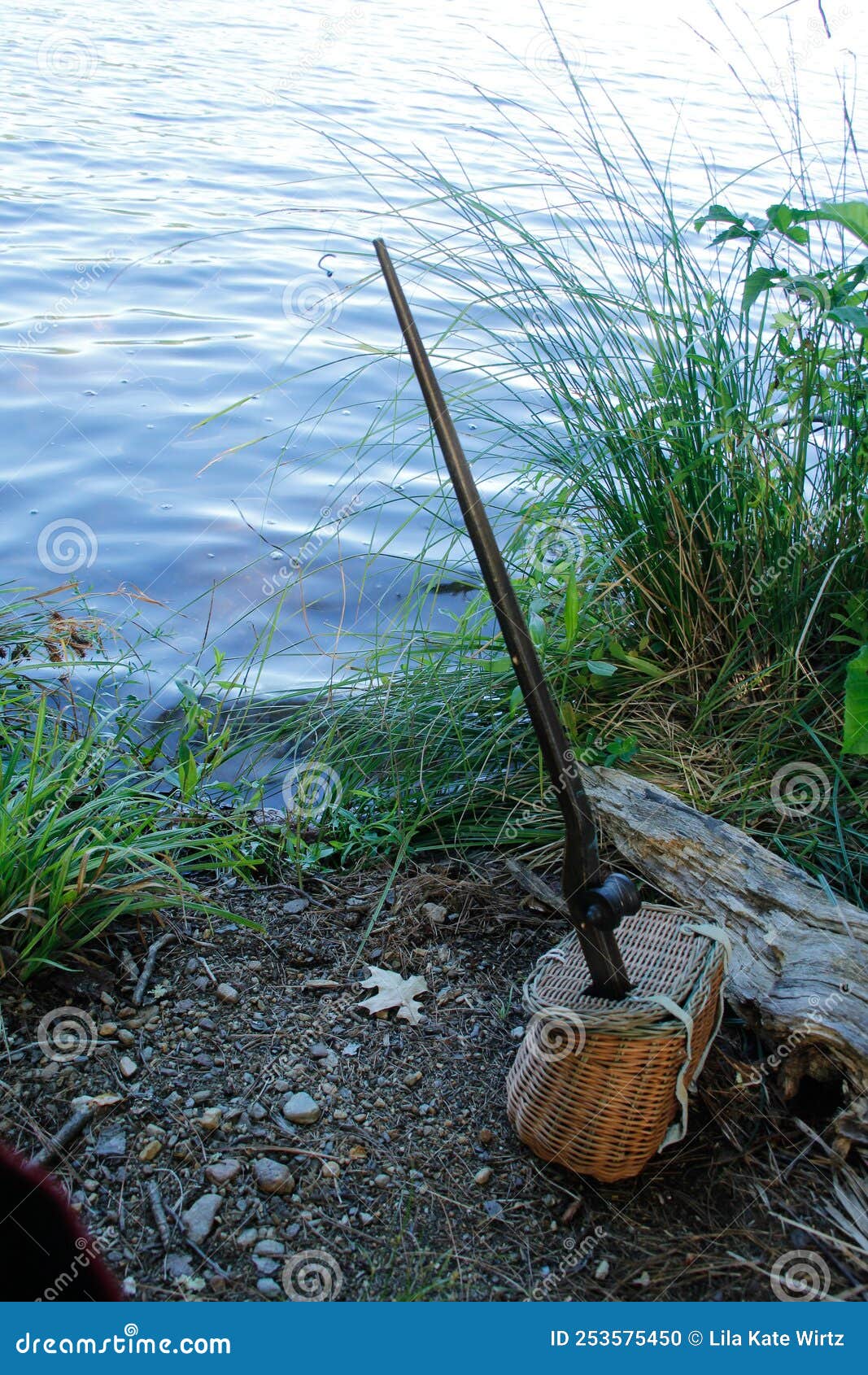 Small Wicker Fishing Basket with Hole for Small Wooden Fishing Pole with  Hook on the End Stock Photo - Image of hole, antique: 253575450