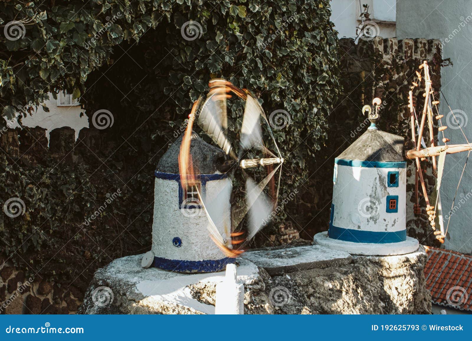 small windmills in an amusement park in aldeia jose franco, mafra, portugal