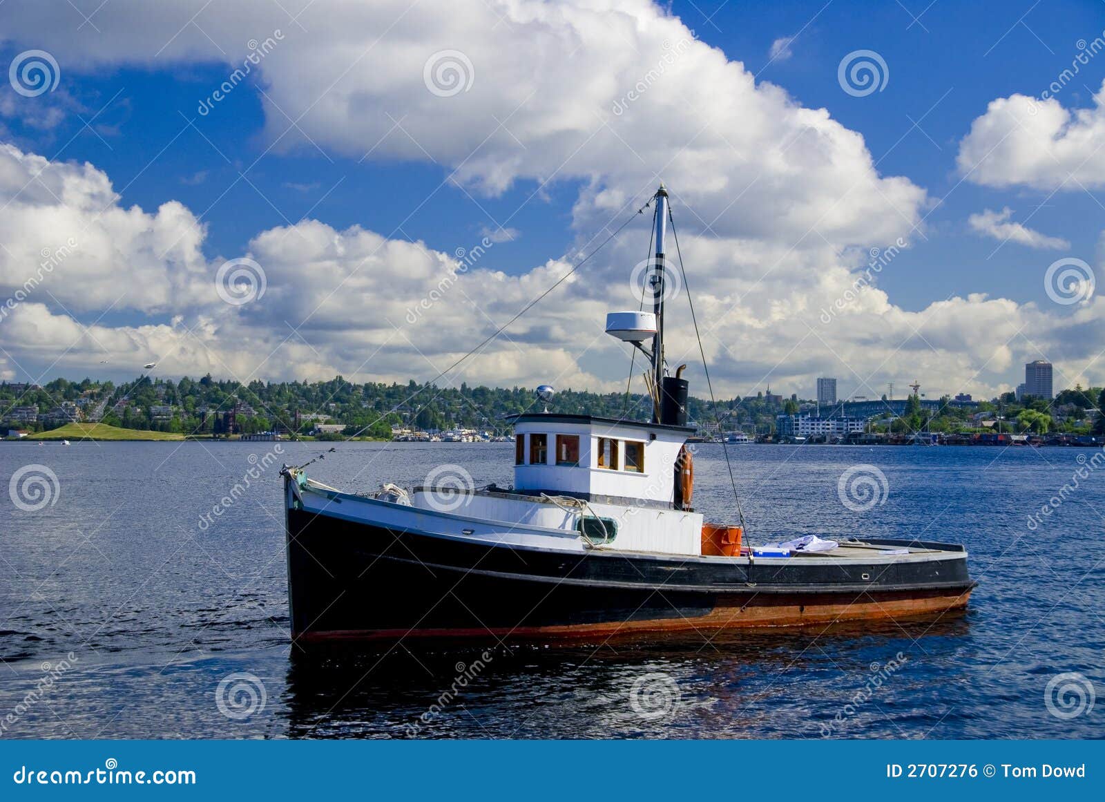 small wooden fishing boat on Lake Union in Seattle, WA.