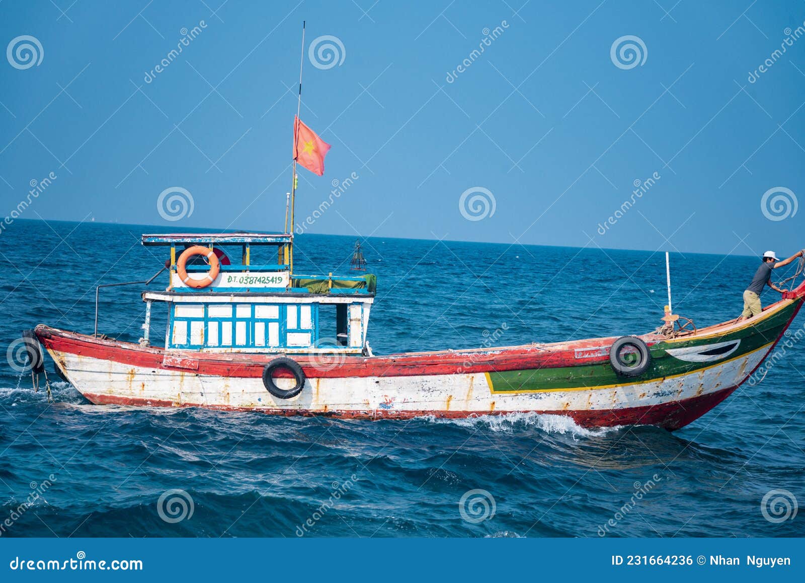 Small Wooden Boat Fishing in the Sea Editorial Photo - Image of