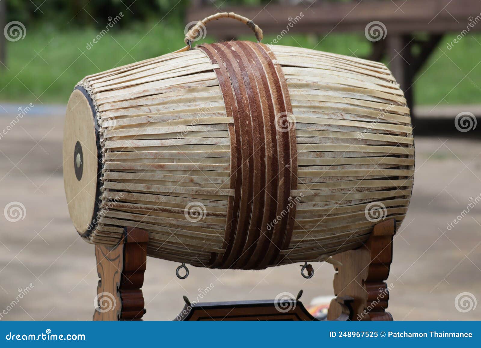A Small Wooden Drum is a Thai Musical Instrument Located Outdoors ...
