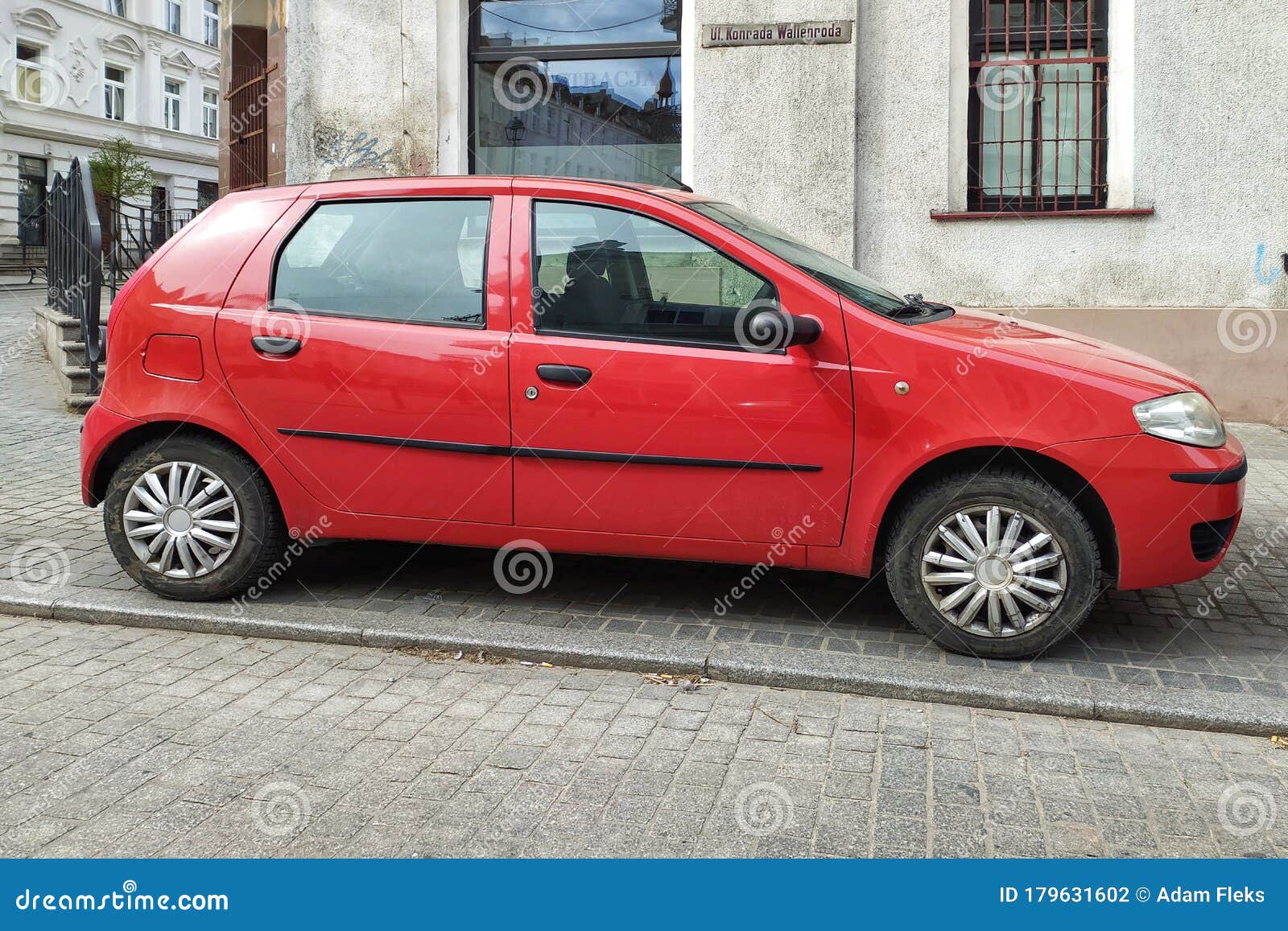 Old Red Fiat Punto Fourdoors Parked Editorial Stock Image - Image