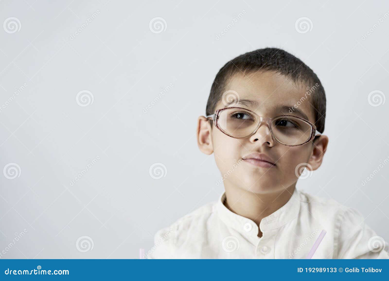 Smart boy in glasses stock image. Image of camera, indoors 192989133