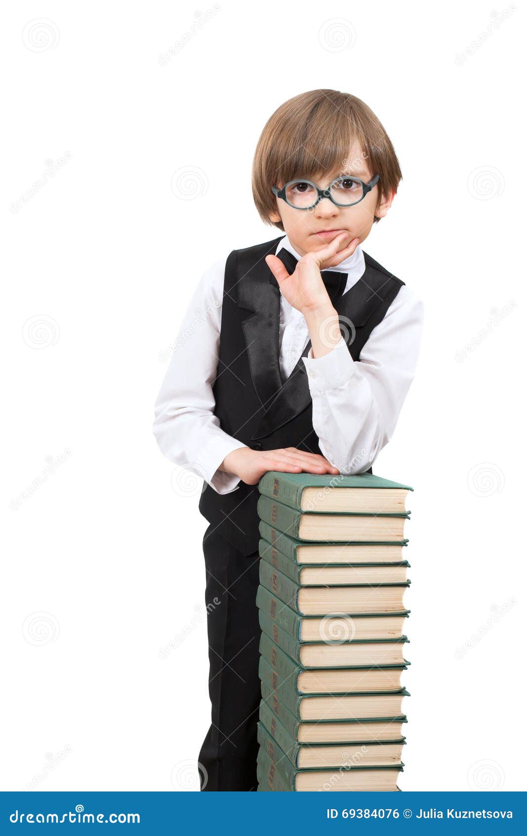 A smart boy in glasses stock photo. Image of background 69384076