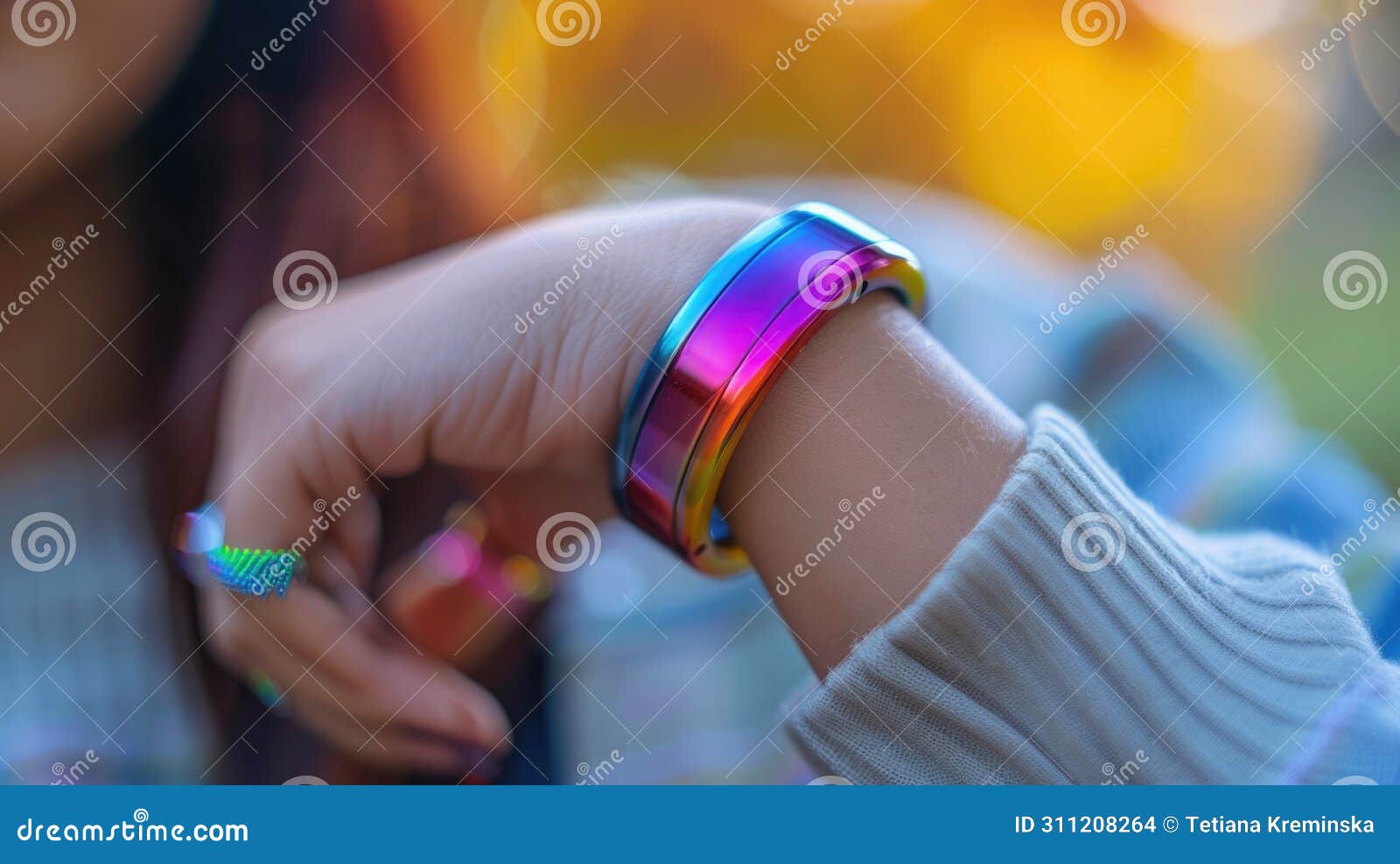 a smart bracelet that adjusts its color and vibration patterns to improve the wearer's mood, blending fashion with