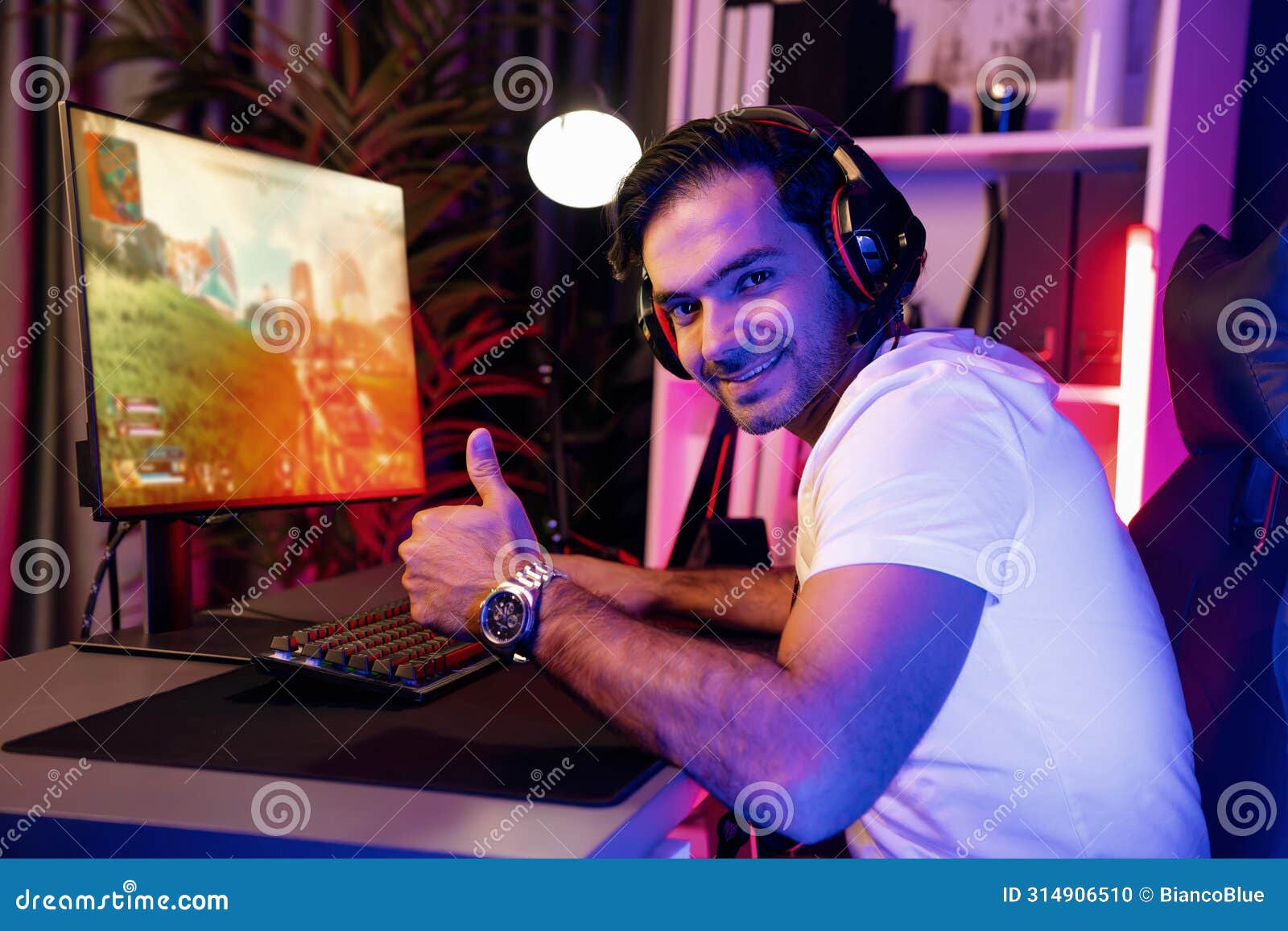 smart gaming streamer enjoy playing battle team looking camera to pose. surmise.