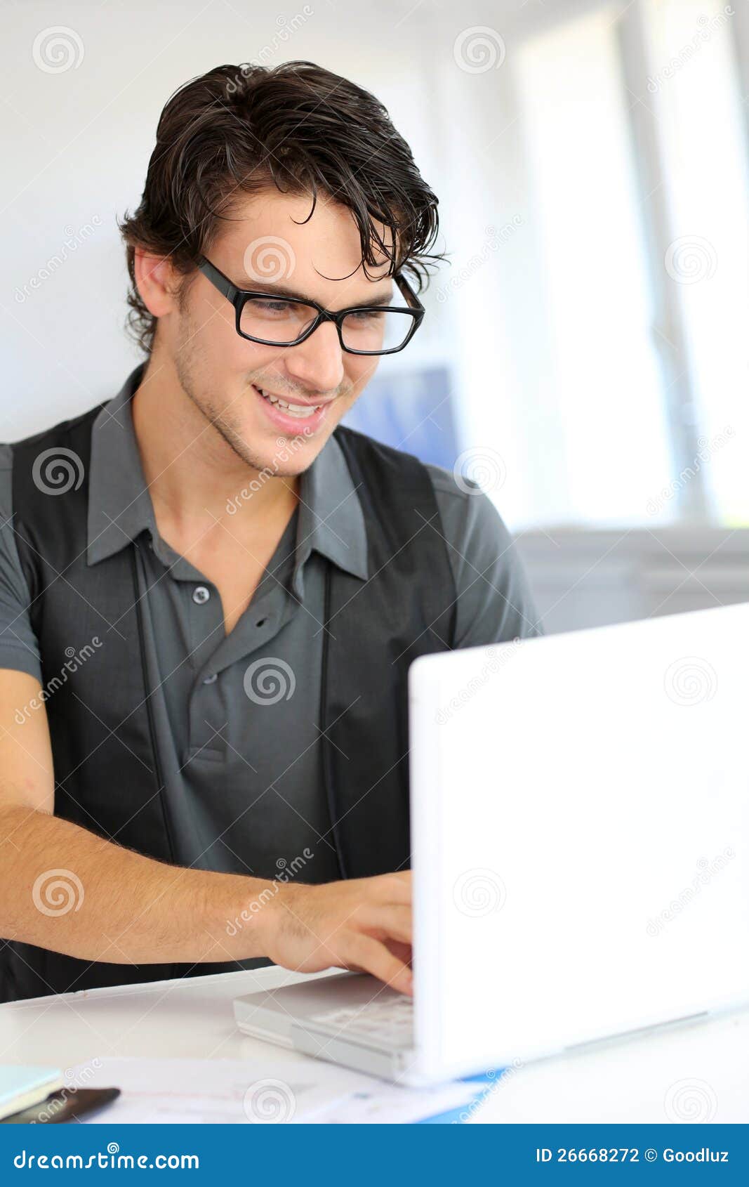 Smart guy in office stock photo. Image of eyeglasses 26668272