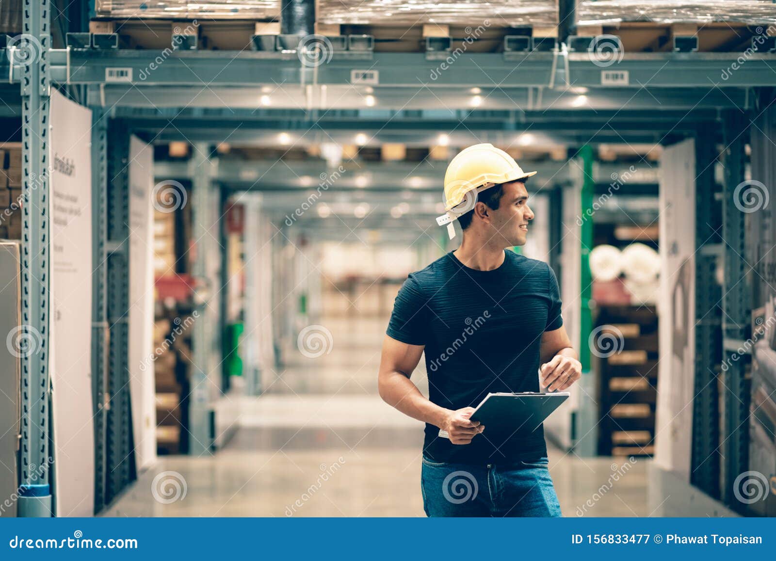 smart indian engineer man worker wearing safety helmet doing stocktaking of product management in cardboard box