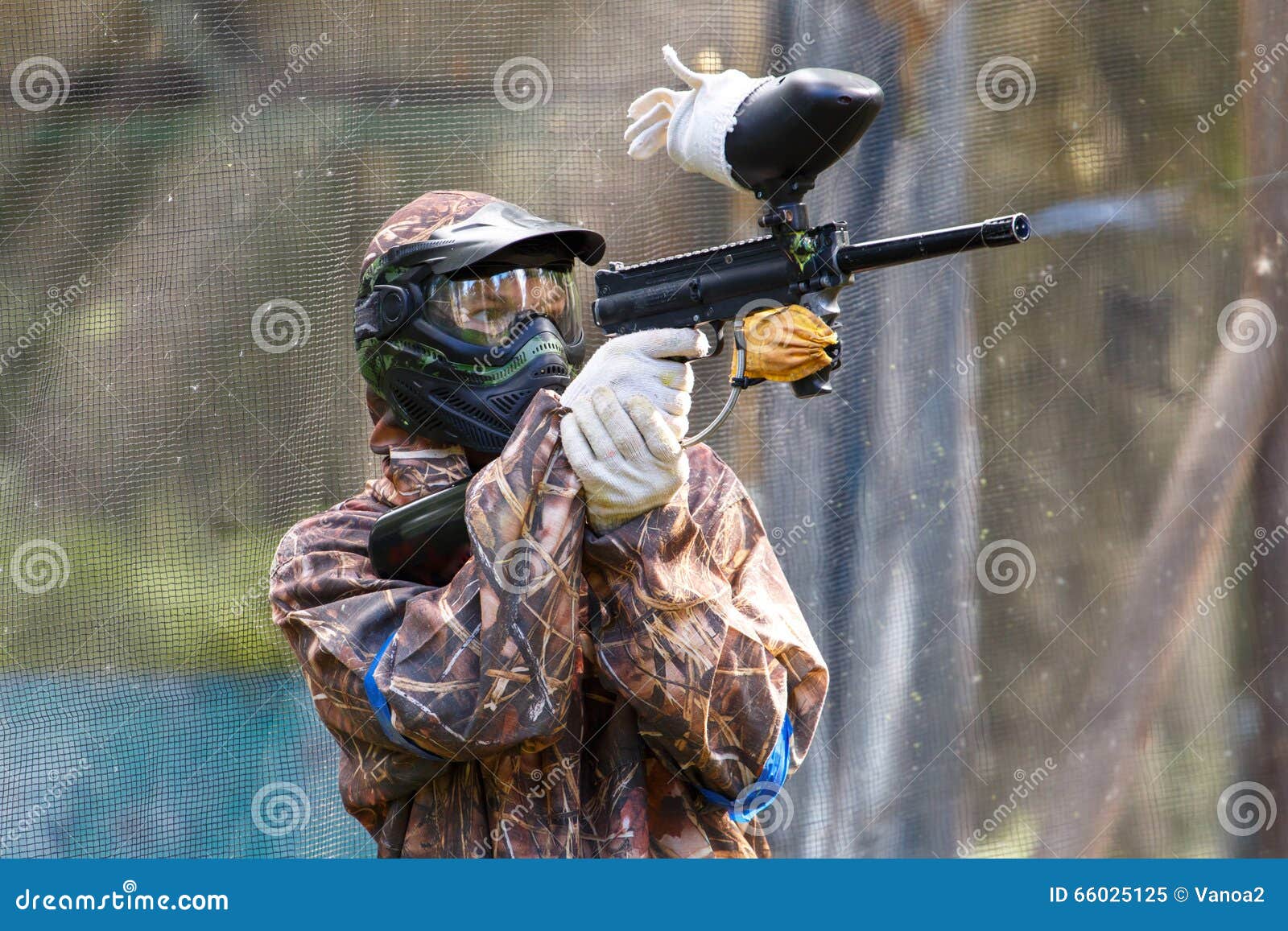 Smart paintball shooter stock image. Image of sport, young 66025125