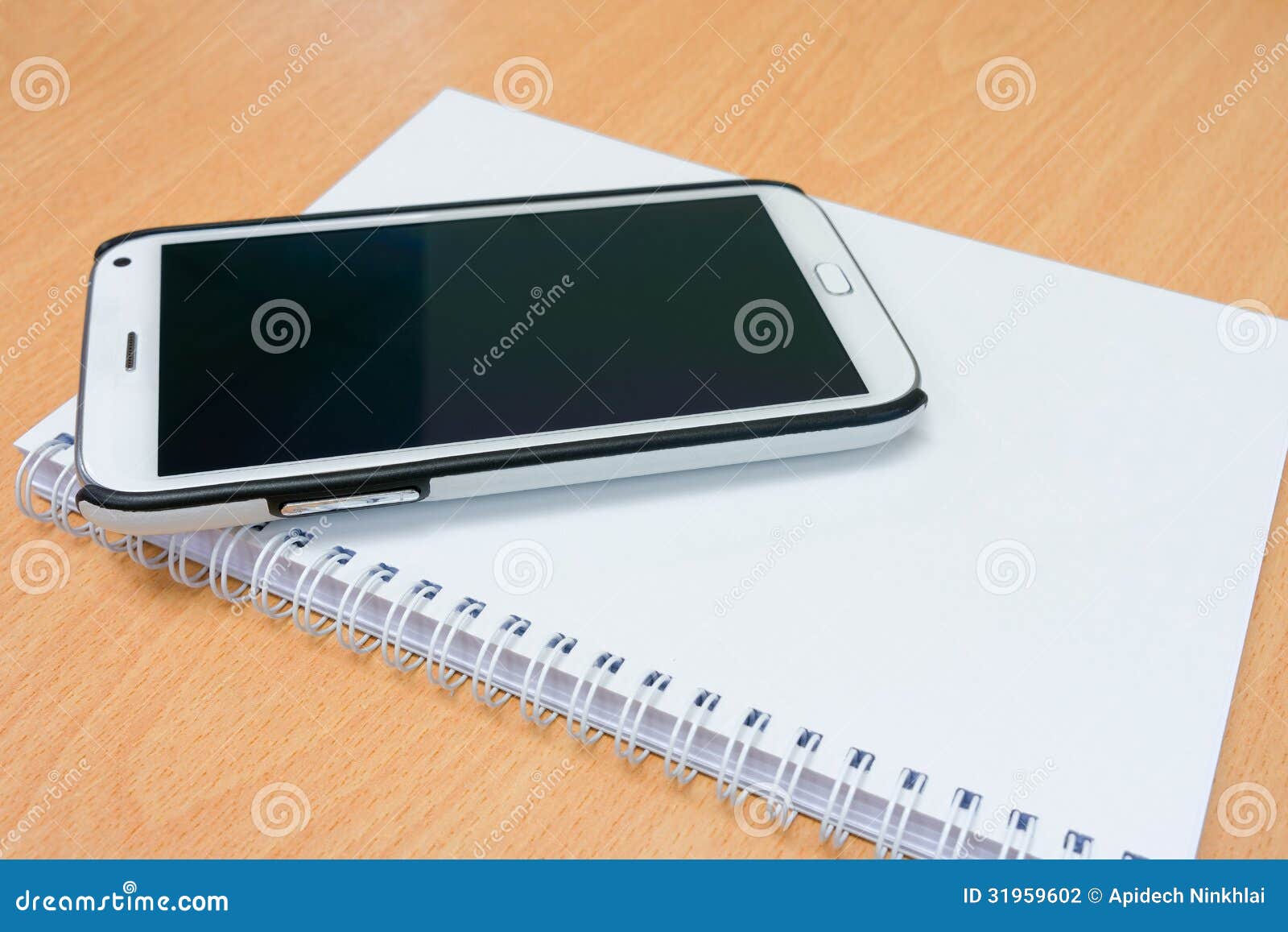 Smart phone and notebook stock photo. Image of background 31959602