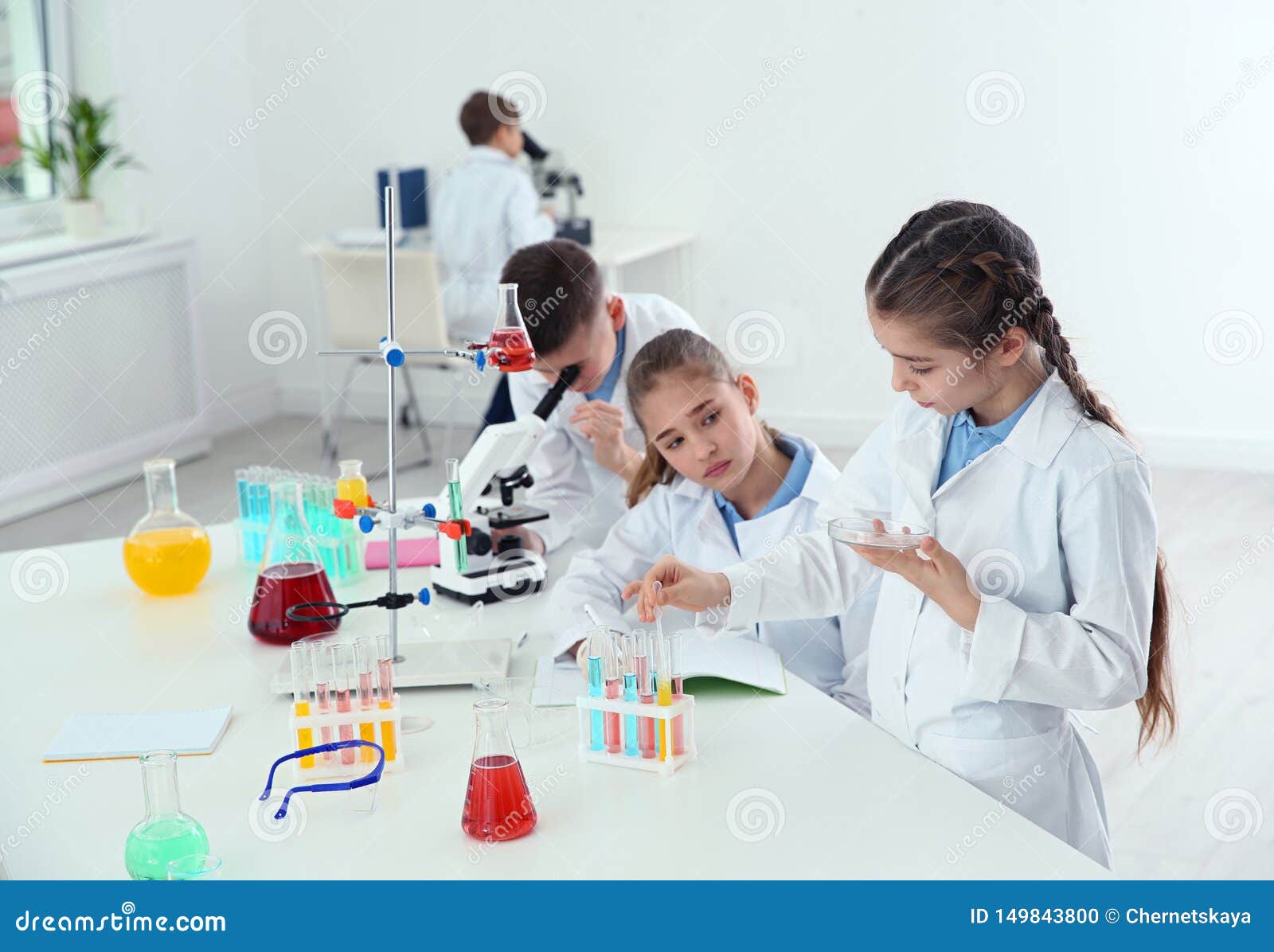 Smart Pupils Making Experiment at Table in Class Stock Photo - Image of ...