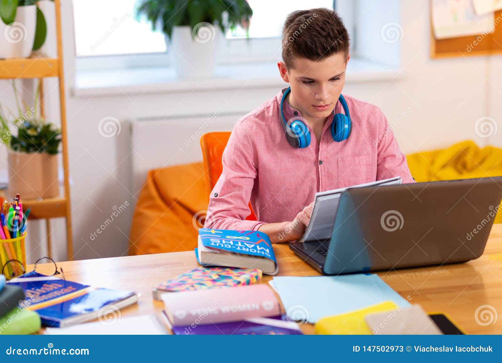 Smart Student Doing Math Homework Sitting At The Laptop ...