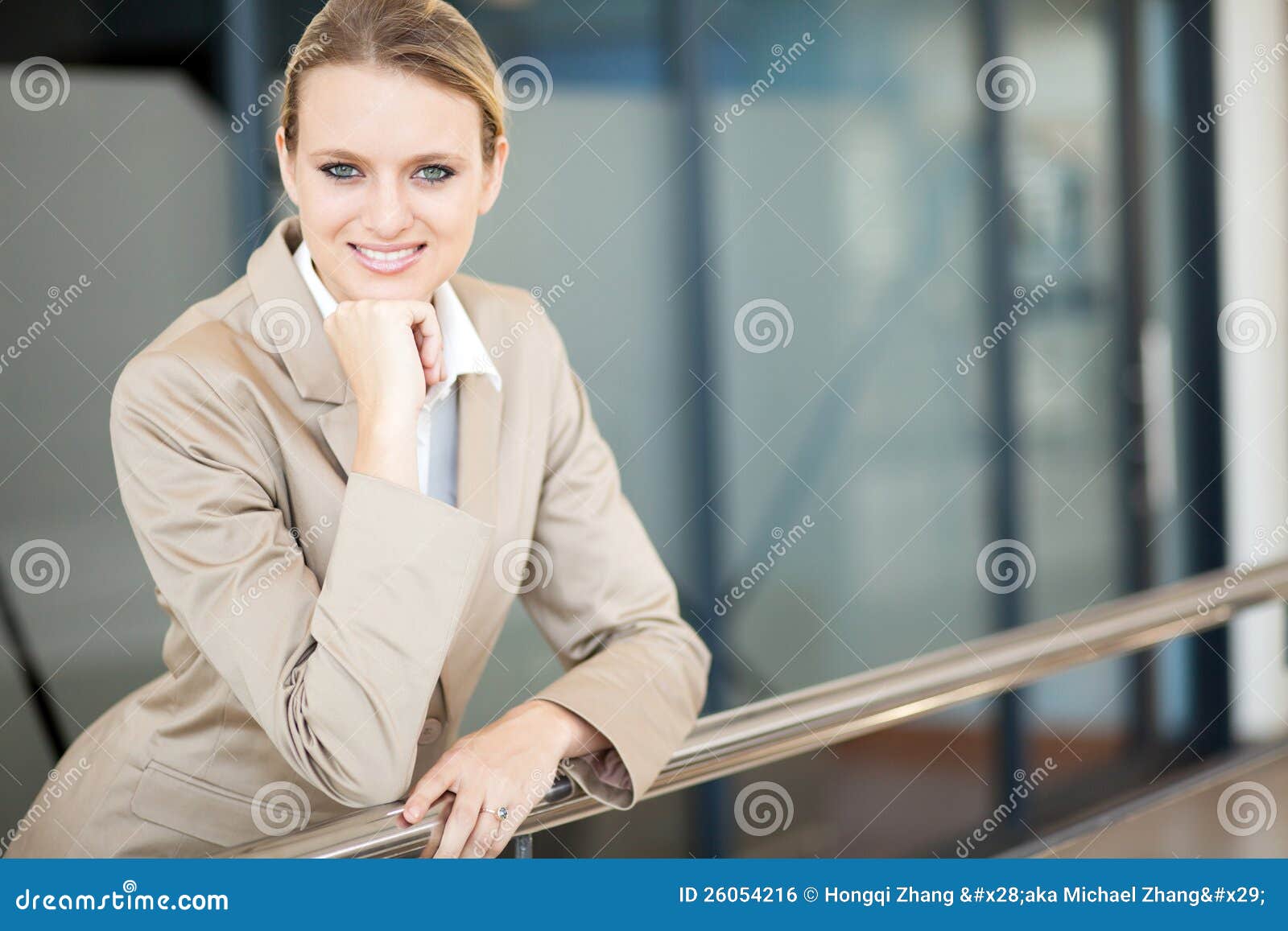 Smart young businesswoman portrait outside office