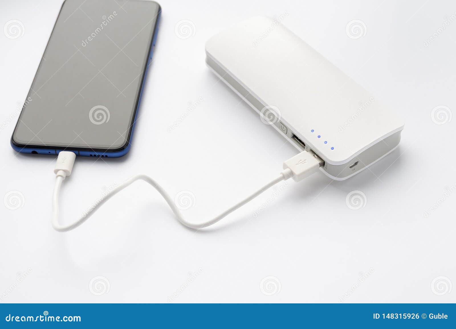The Smartphone is Charging from a Portable Charger. Phone Charging