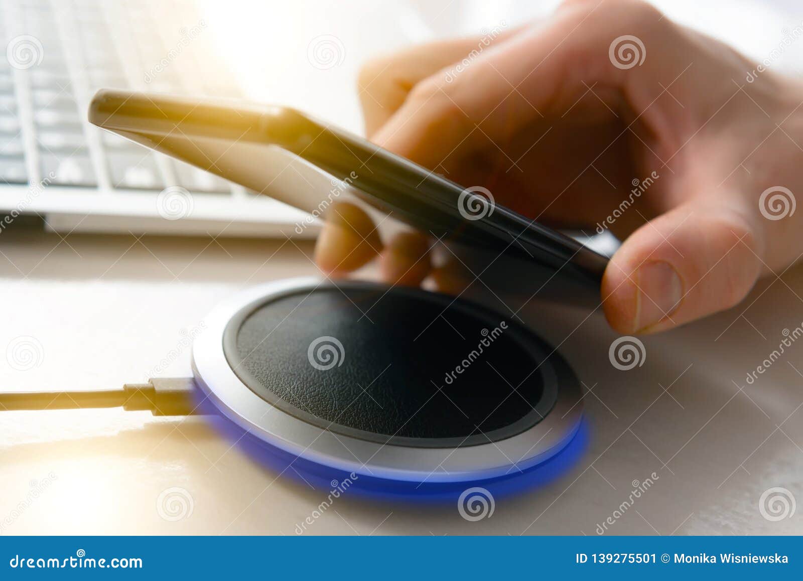 smartphone charging on a wireless charger