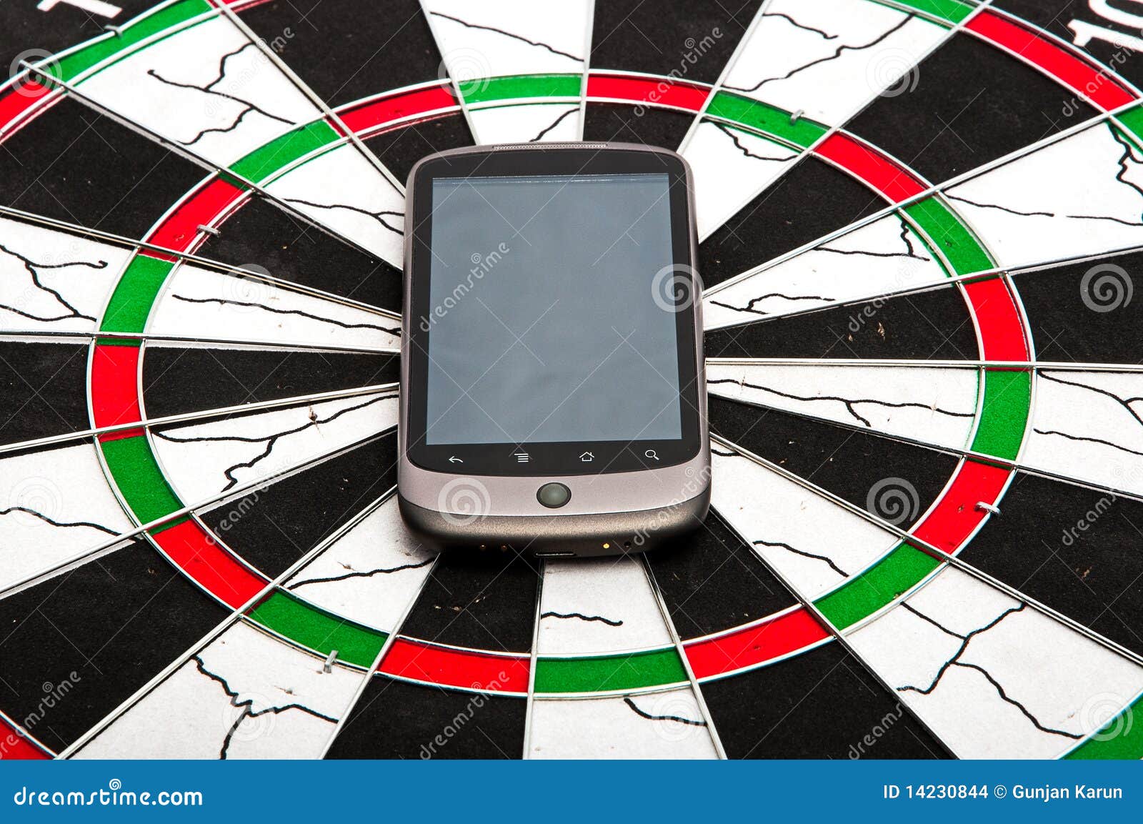 Smartphone on dartboard stock photo. Image of circular 14230844