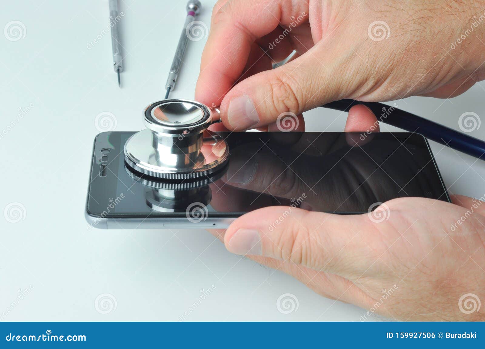 Smartphone and Stethoscope. Diagnostic, Repair and Service Stock Photo