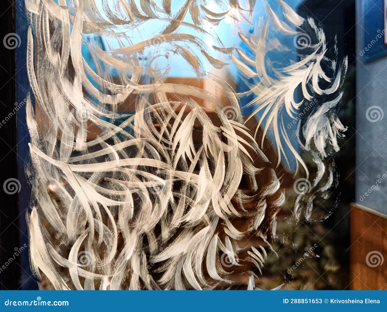 smears of white paint on glass that look like frost in cold winter. abstract background, texture, frame, space for text