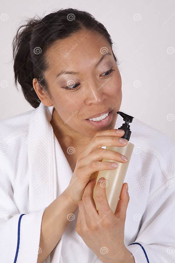 Smelling massage oil stock image. Image of lifestyle 12943109