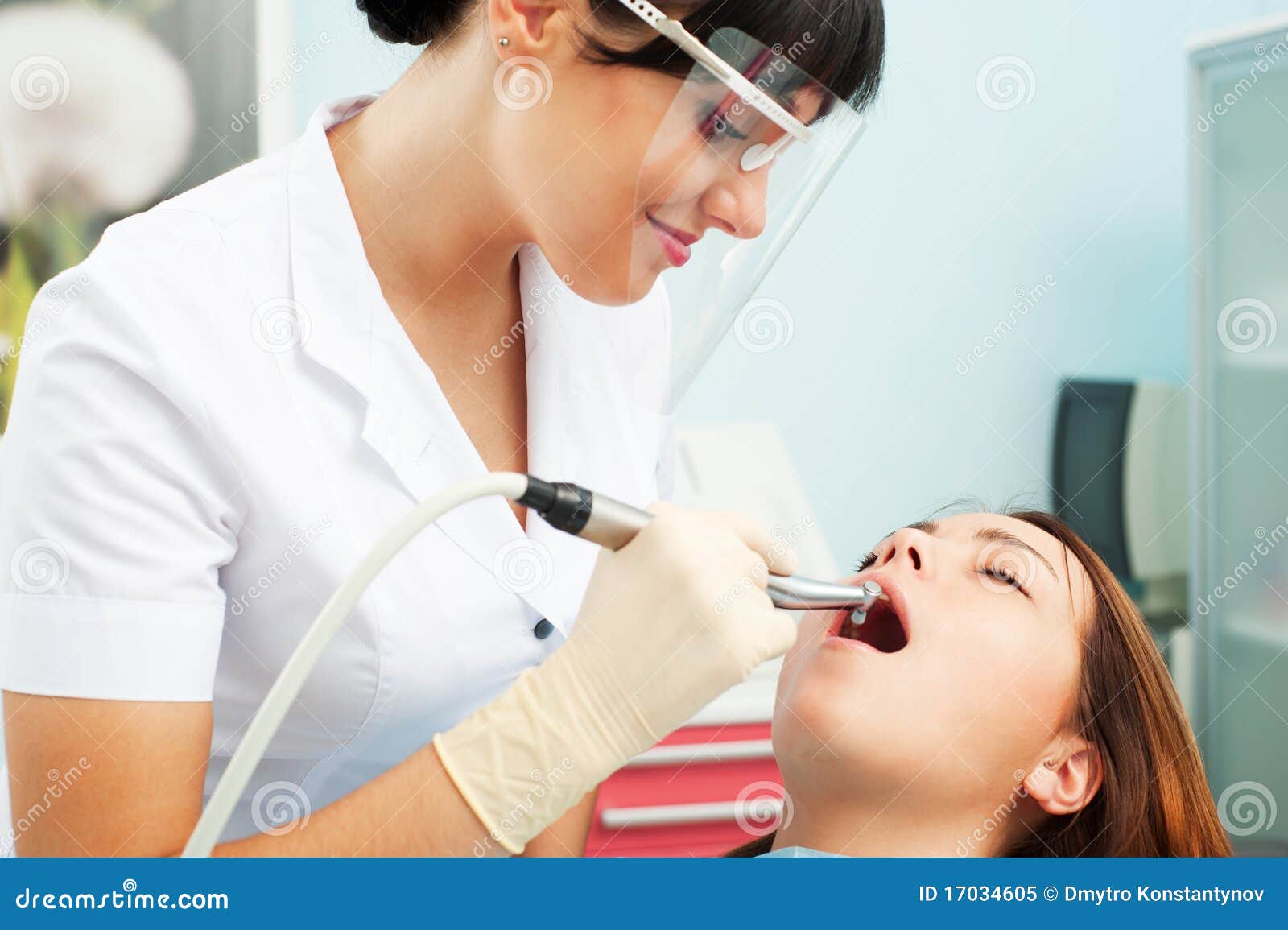 Smiley dentist and patient stock image. Image of health 17034605