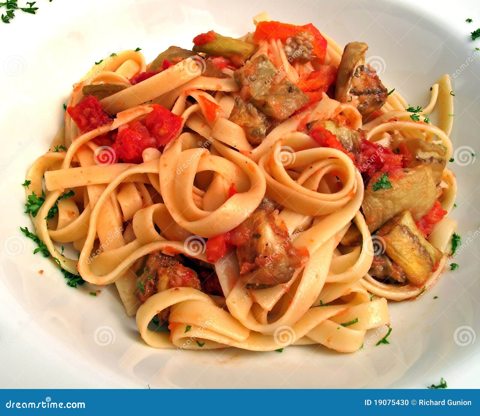 Smiley Face Eggplant Pasta stock photo. Image of pasta 19075430