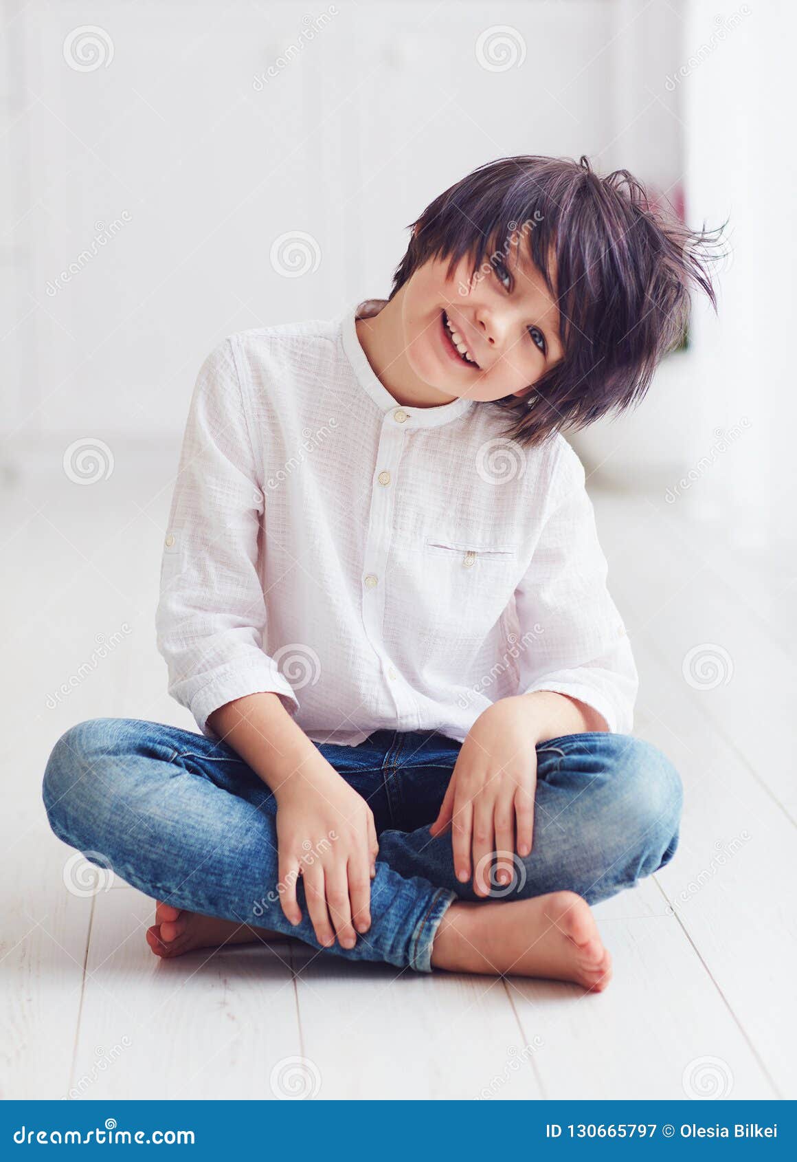 Smiling Anime Manga Young Boy Character Posing Barefoot In Bright Room