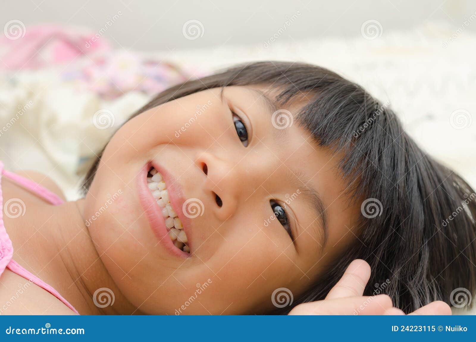 Smiling Asian Girl Lay Down On Bed Stock Image Image Of Eyes Teeth 24223115