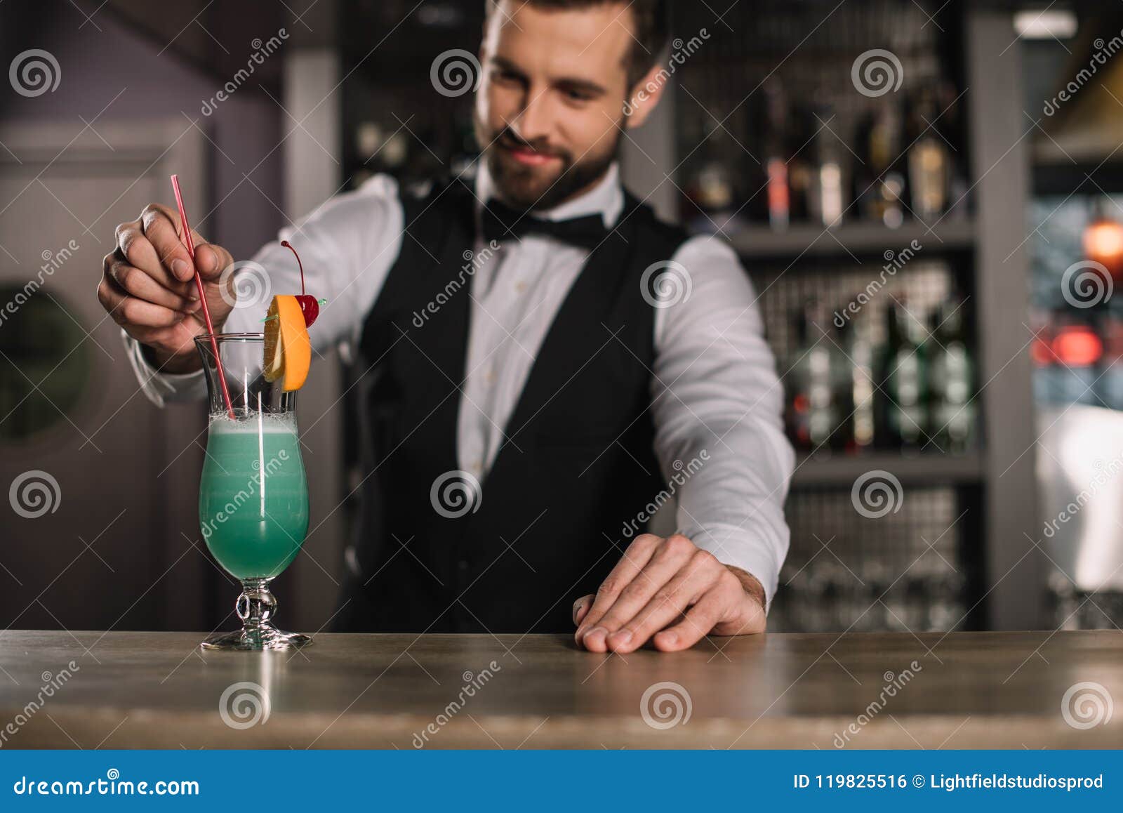 Smiling Bartender Adding Plastic Straw Stock Photo Image of work