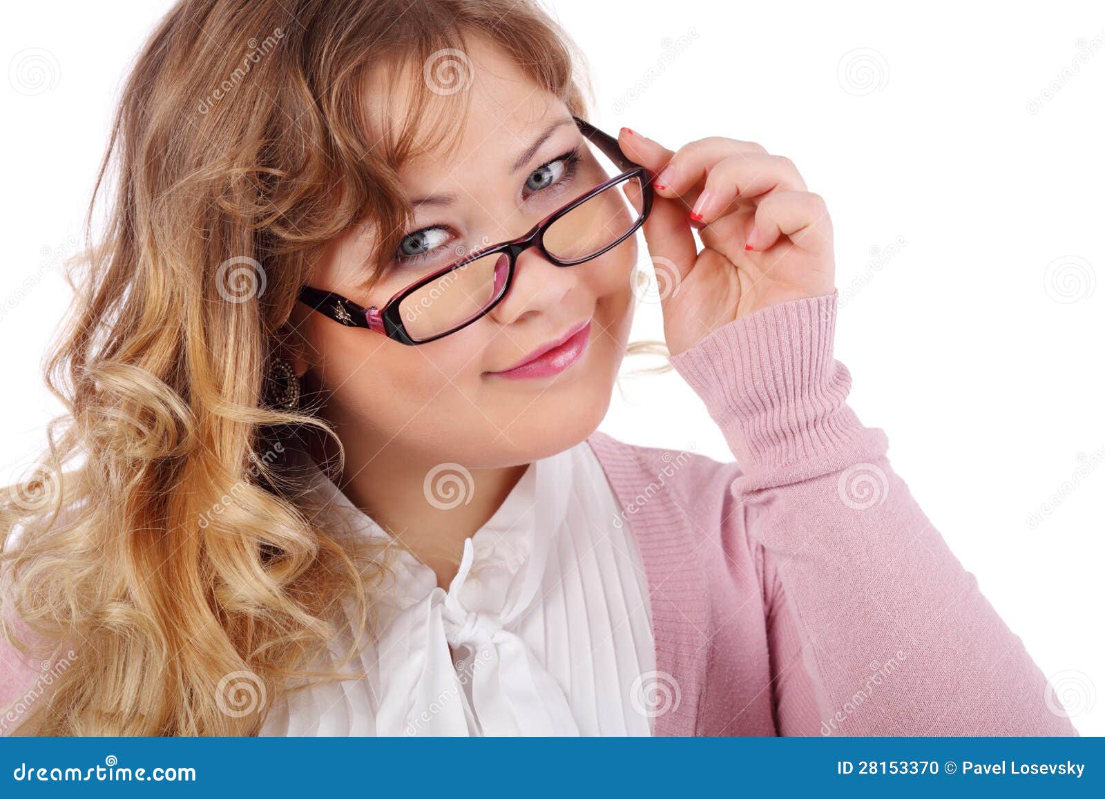 smiling beautiful woman in glasses looks at camera