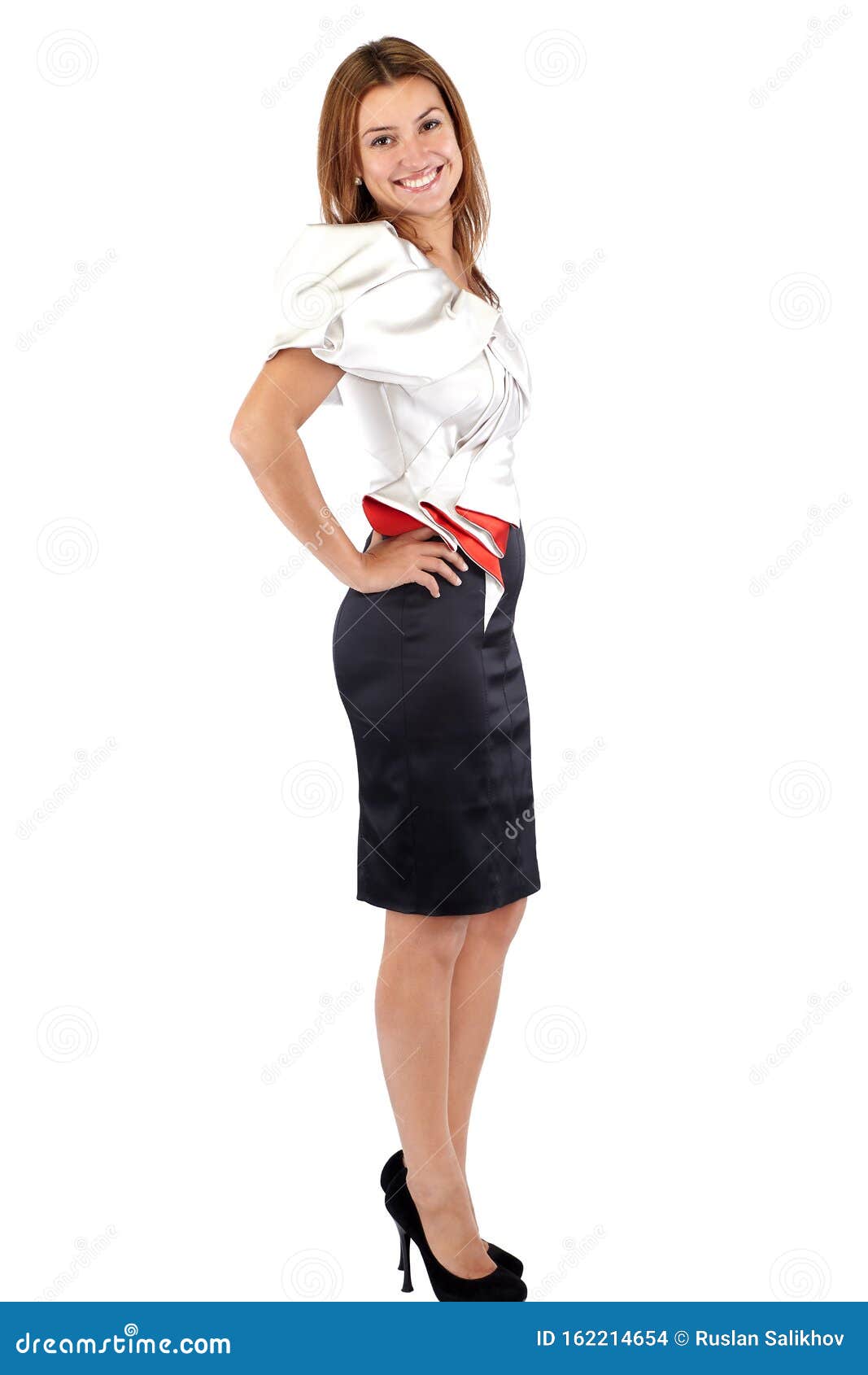 Smiling Beautiful Young Woman In Black White Red Dress Standing Sideways And Looking At Camera