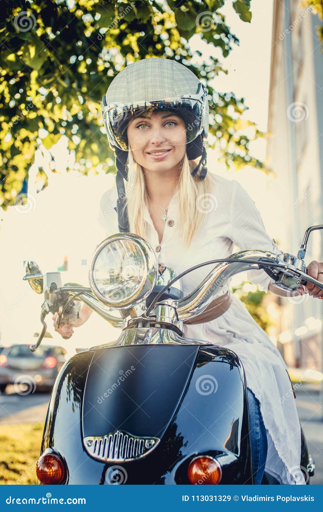 Smiling Blond Female in Jeans, and Helmet Stock Image - of adult, slim: