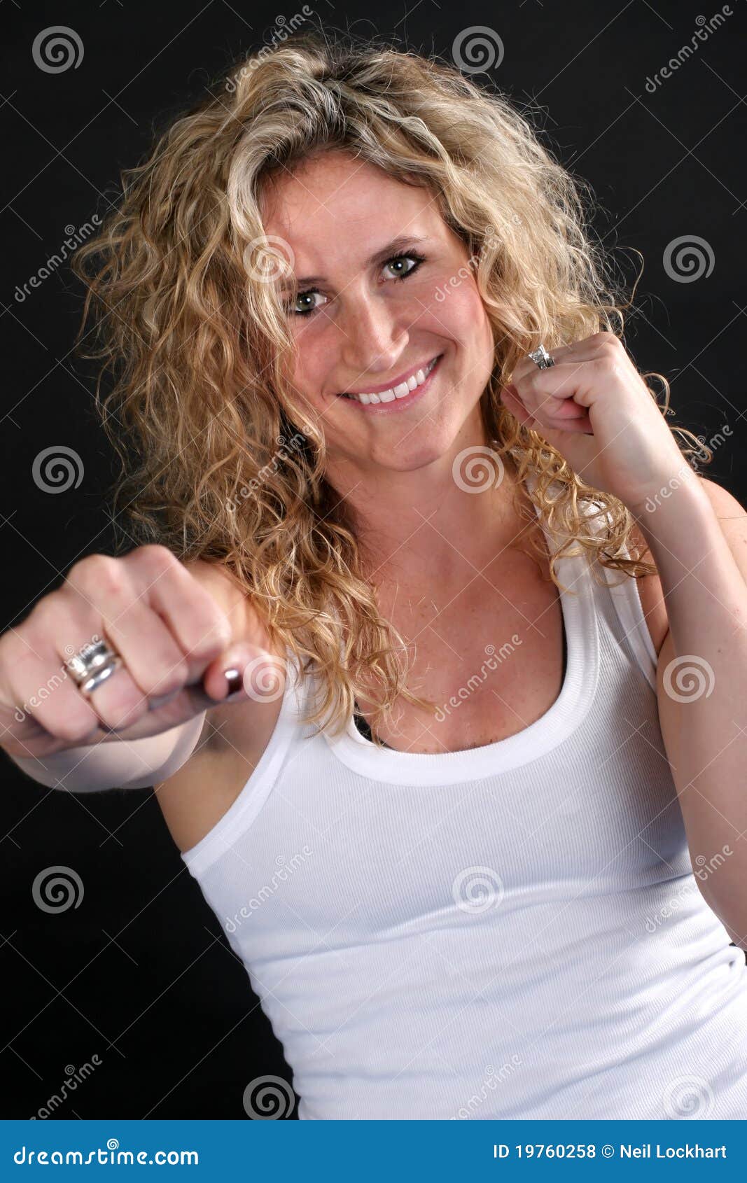 Smiling Blond Girl Punching Stock Photo Image of happy, mixed 19760258