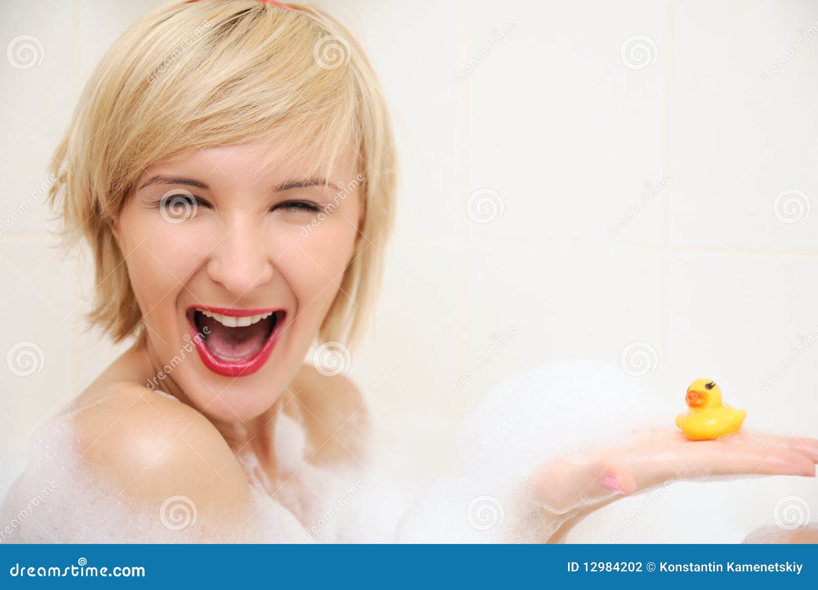 Smiling Blond Woman Lying In Bubble Bath Stock Photo Image Of