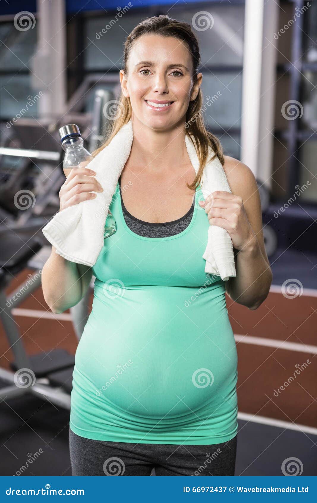 Smiling Blonde Standing with Towel Around Neck Stock Image Image of