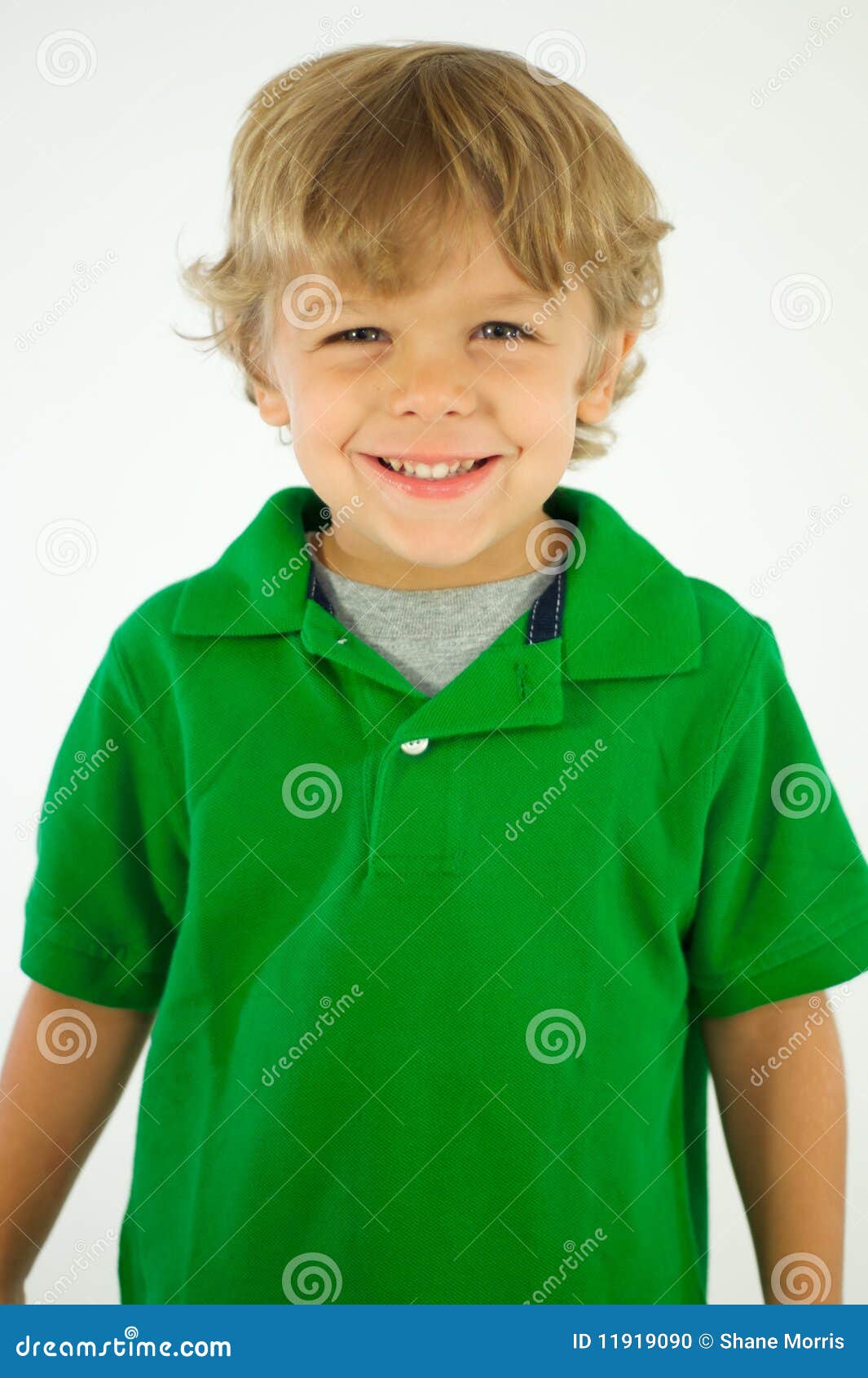 Smiling Boy in Green Shirt stock photo. Image of child 11919090