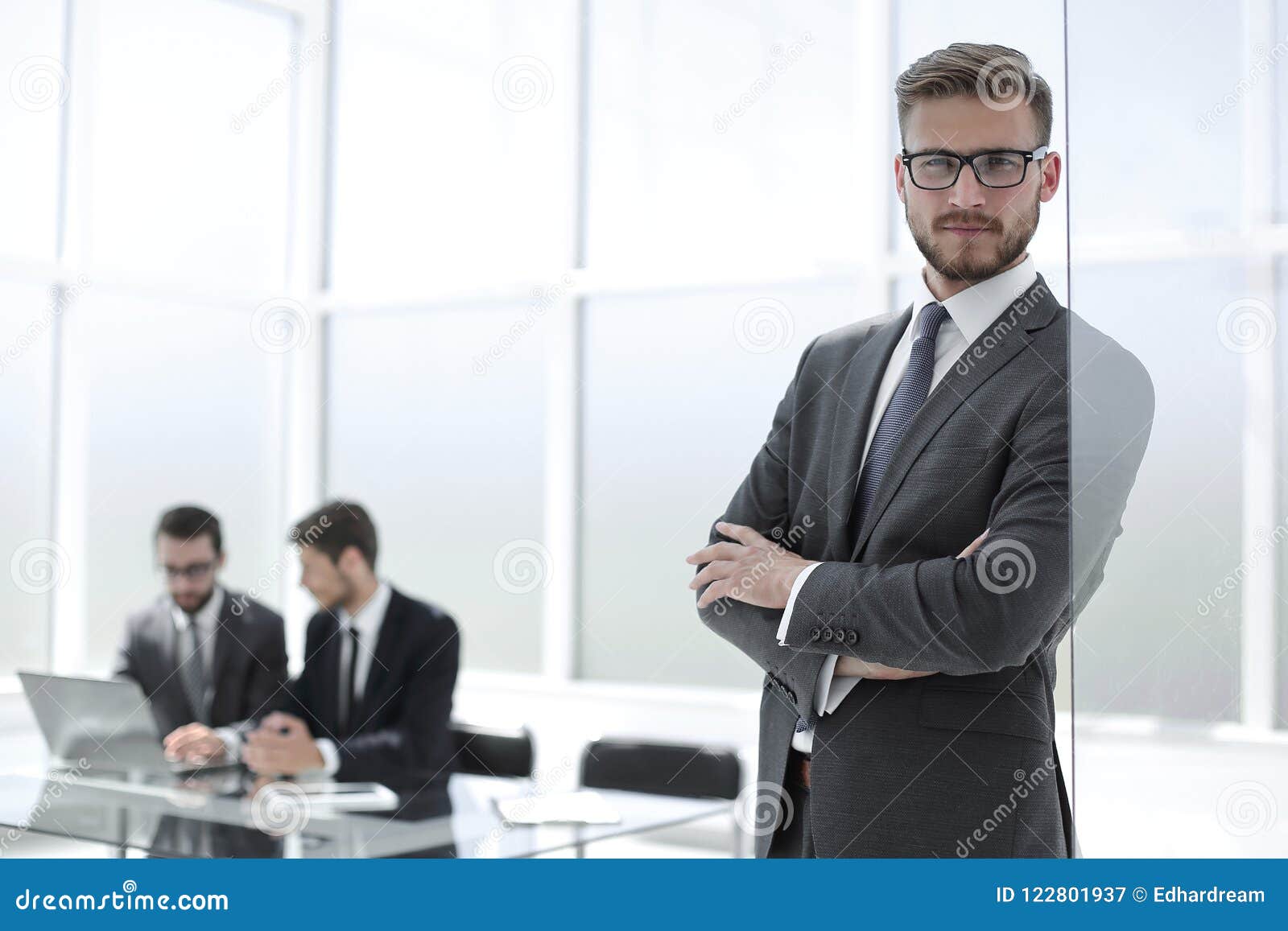 smiling businessman on blurred office background stock image image blurred office background