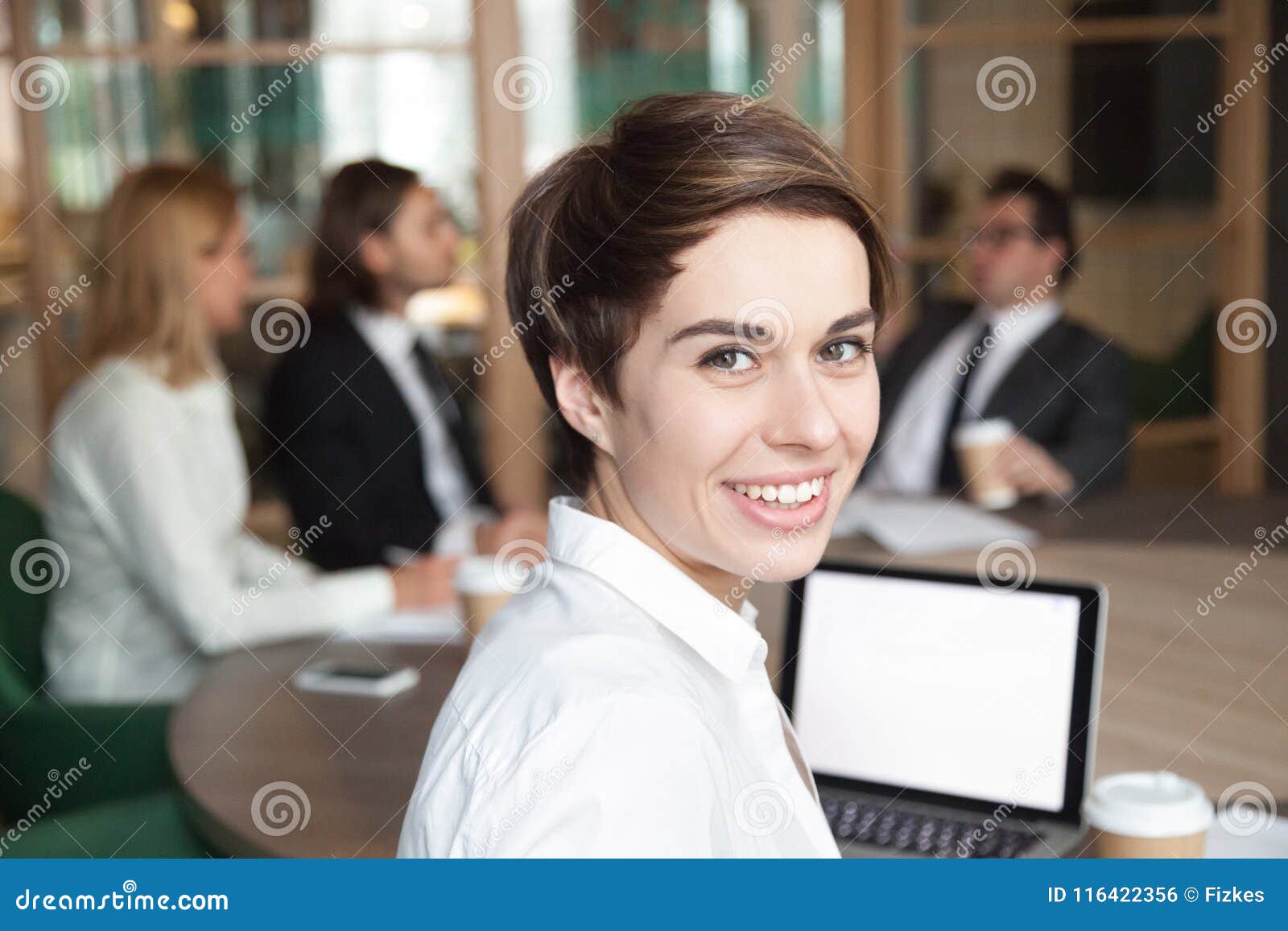 smiling businesswoman professional interpreter looking at camera
