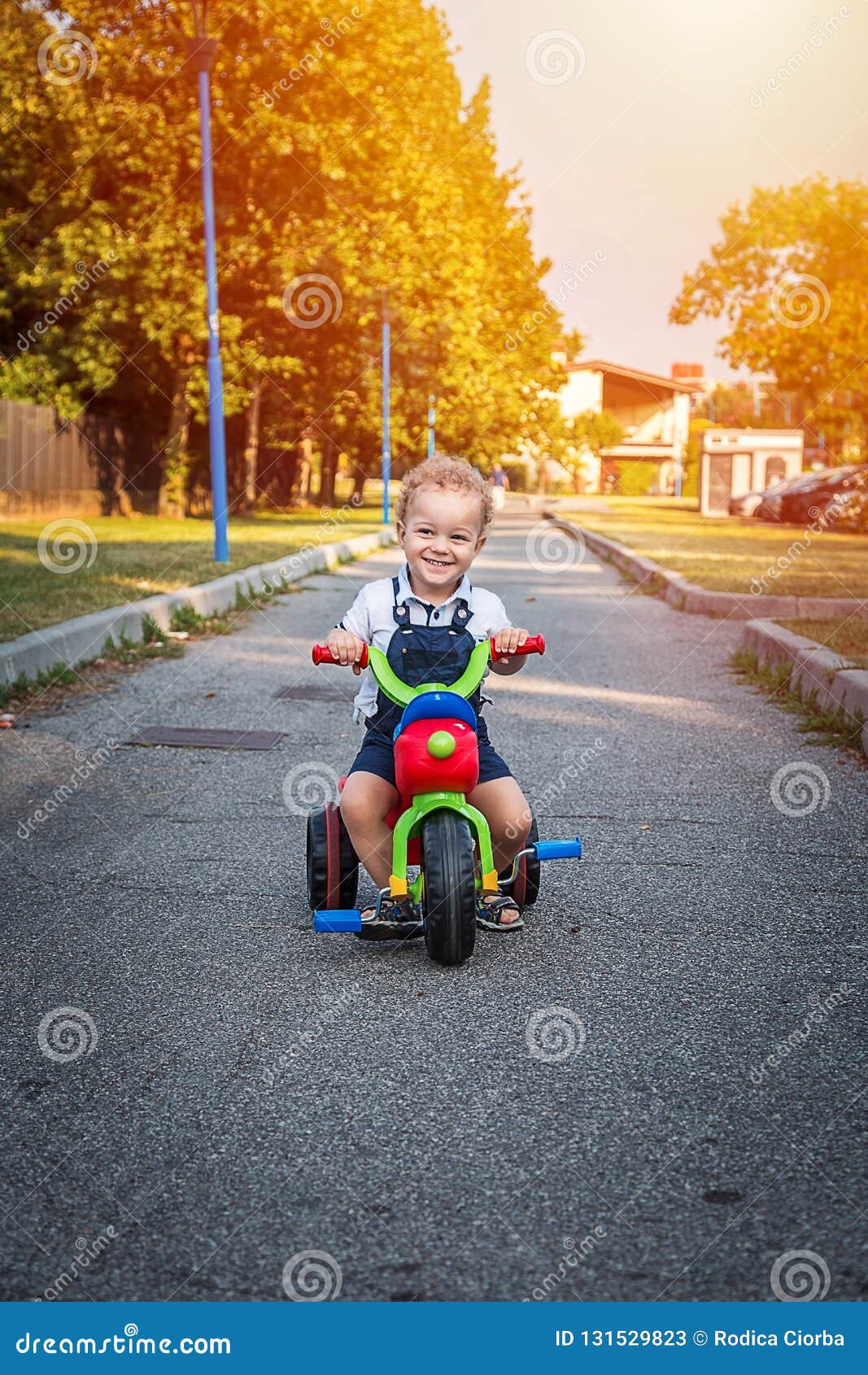 Download Smiling Children Baby Boy Riding Bicycle Outdoor Stock Image - Image of bicycle, little: 131529823