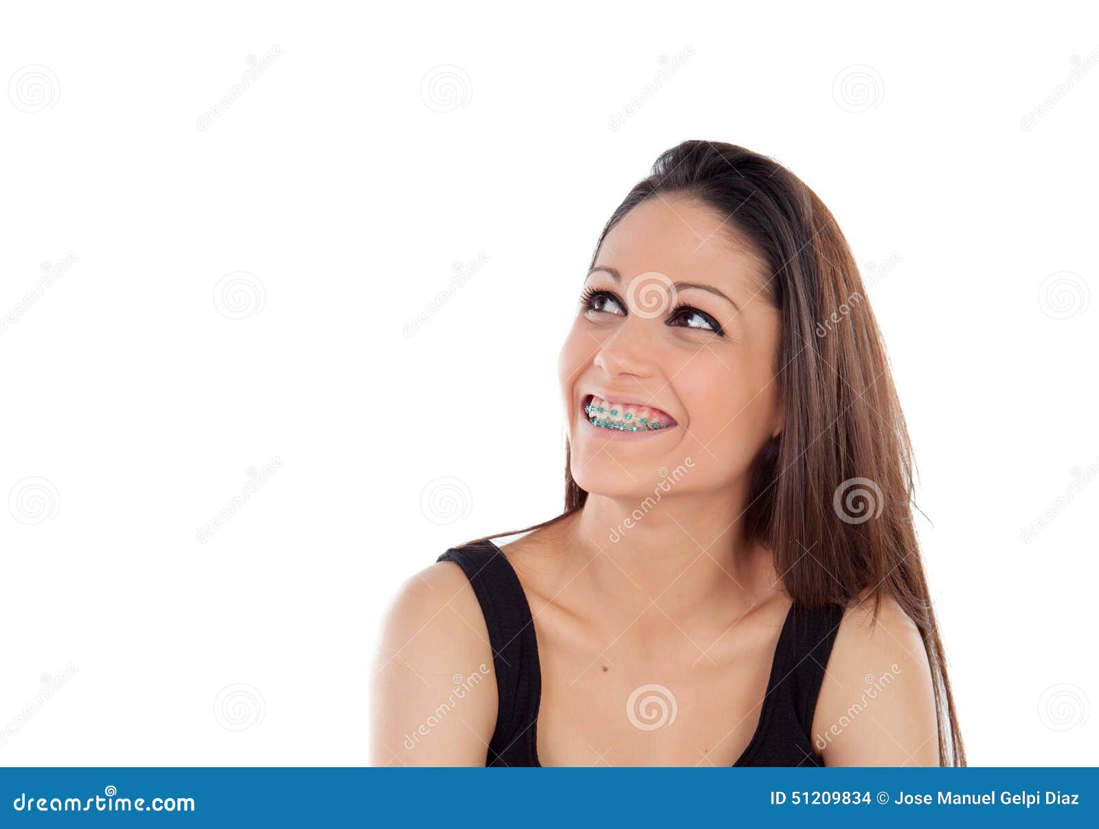 Smiling Cool Girl with Brackets Looking Up Stock Photo Image of face