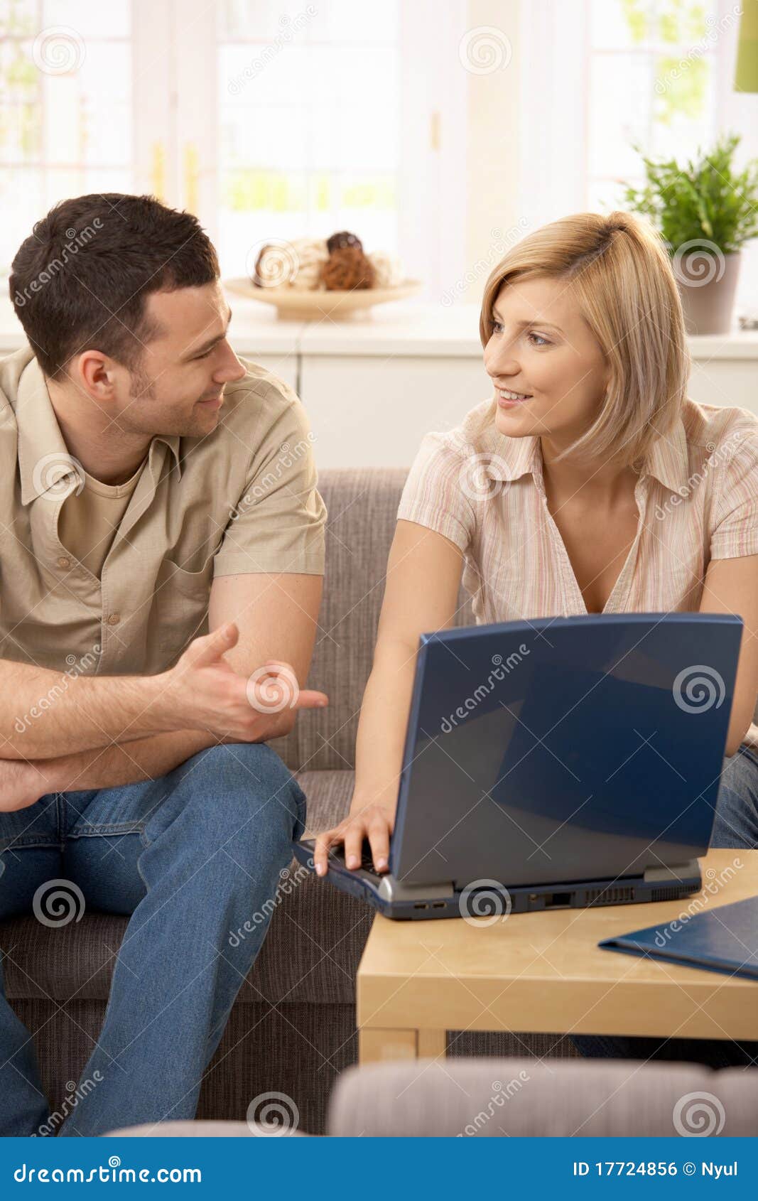 Smiling Couple in Discussion Stock Photo Image of home, leisure 17724856
