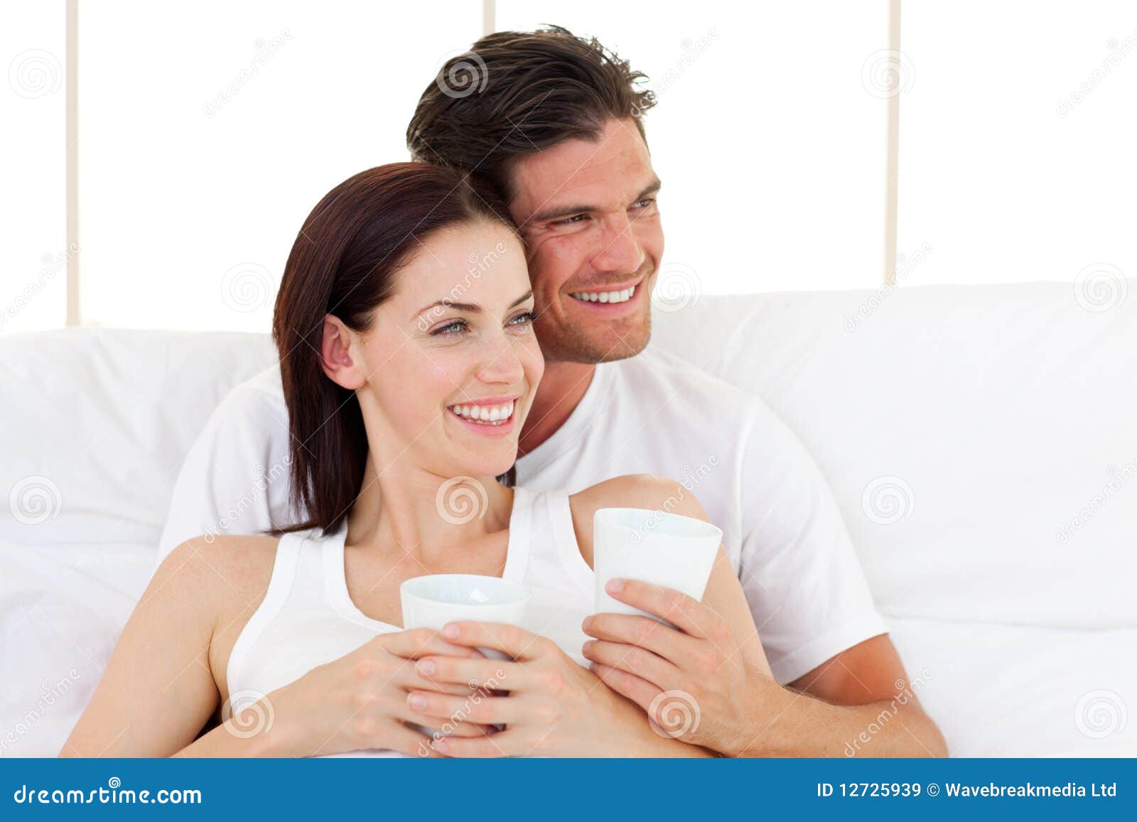 Couple With Towel In The Hotel Room Flirting Stock Photo, Royalty-Free