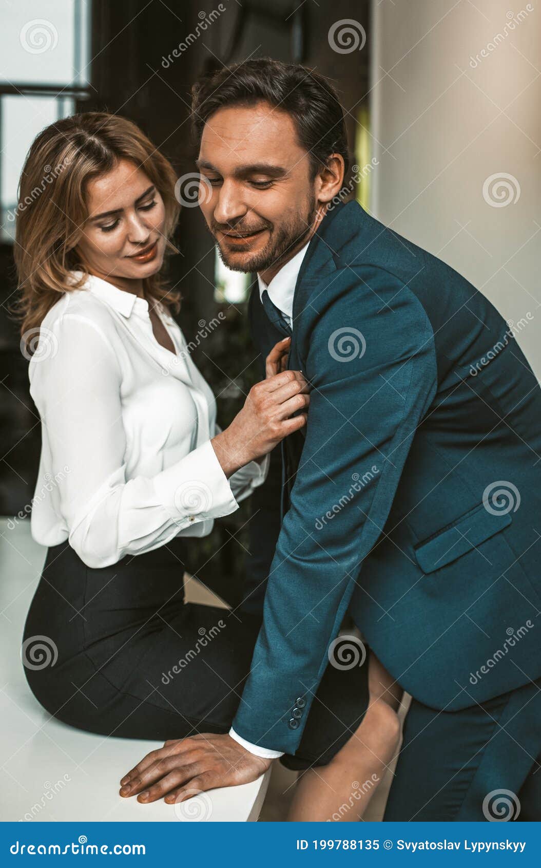 Smiling Couple Flirting at Workplace. Intimate Relationship or