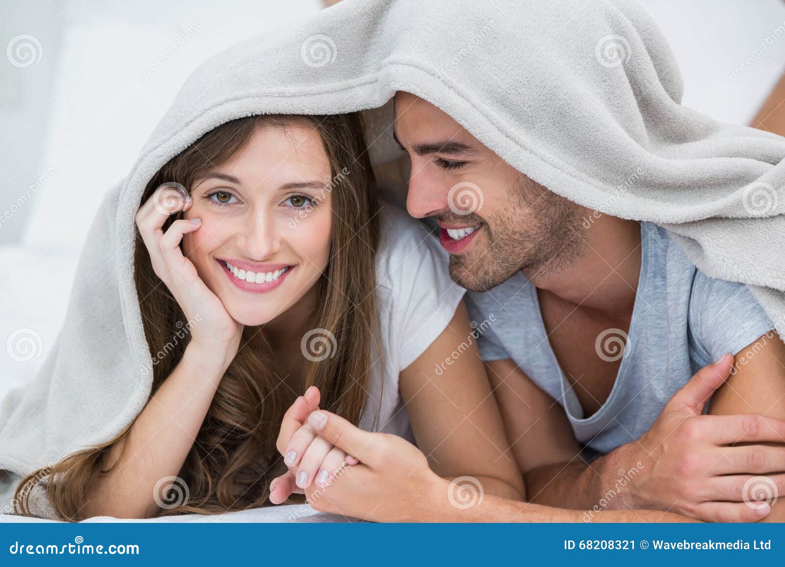 Smiling Couple Lying Under Blanket Stock Image Image of lover, hands 68208321