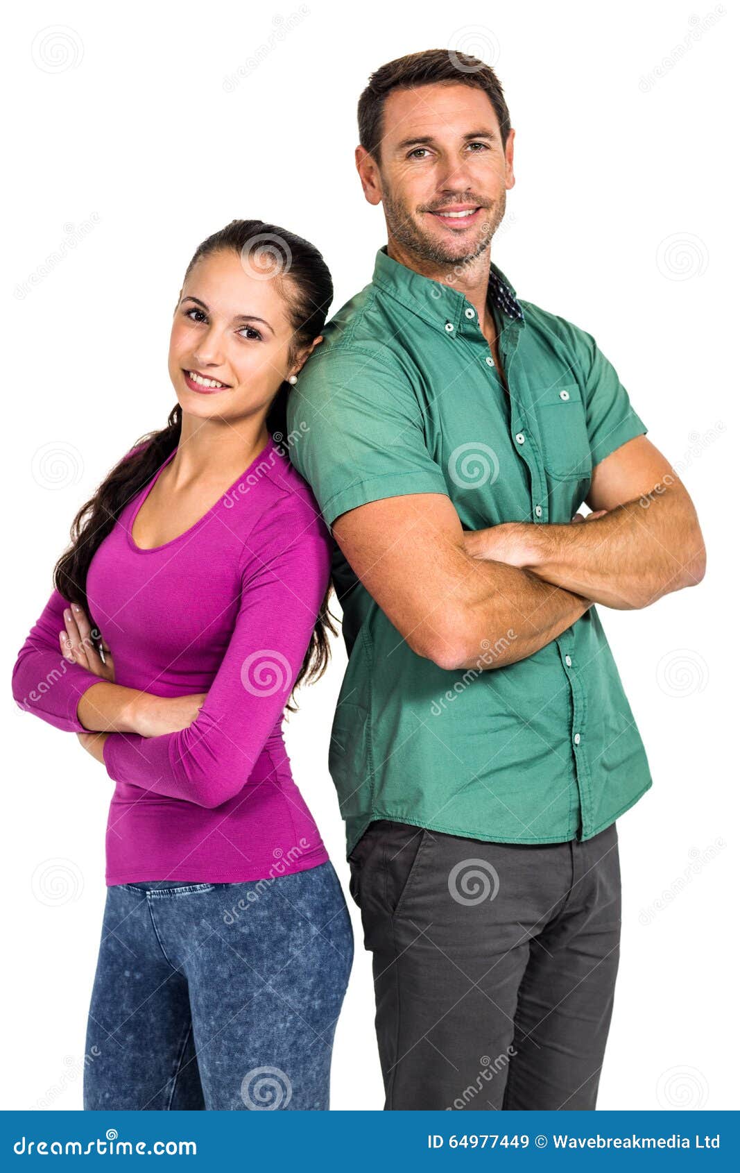 Smiling Couple Standing Back To Back with Arms Crossed Looking at the Camera Stock Image Image